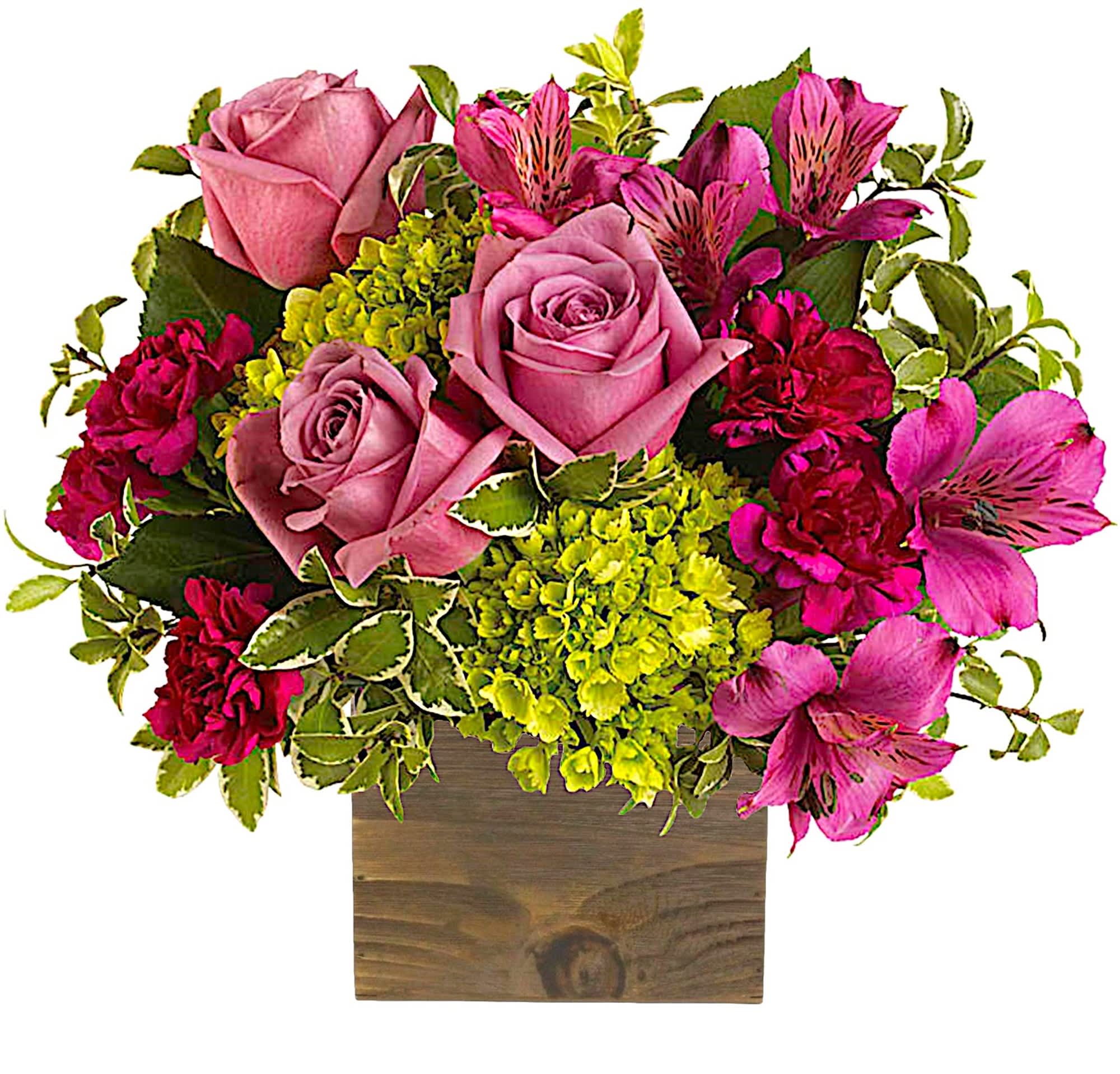 Pink roses and magenta alstroemeria in a wooden box