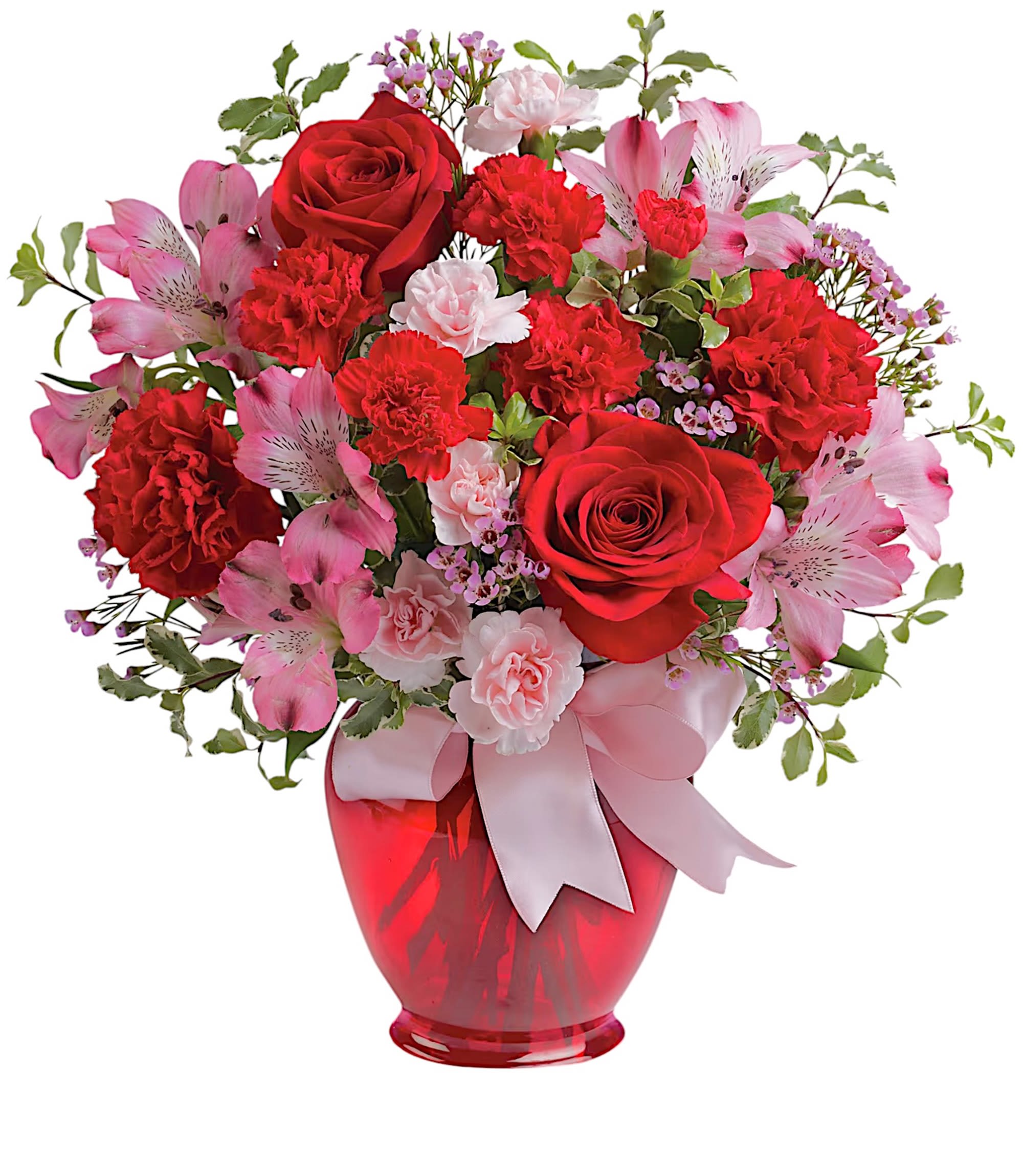 Red roses and pink flowers arranged in a red vase with a ribbon
