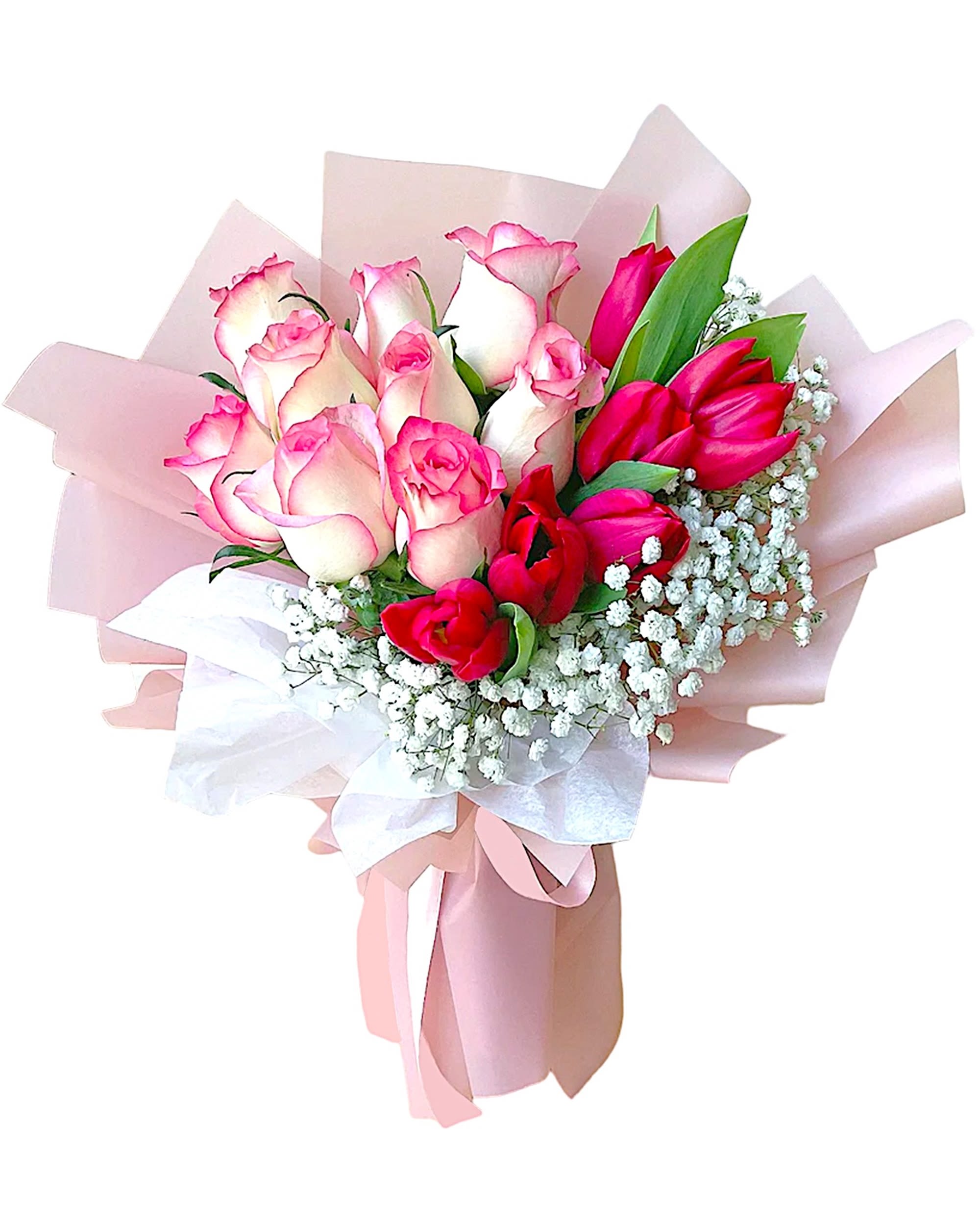 Bouquet of pink and red roses wrapped in pale pink paper
