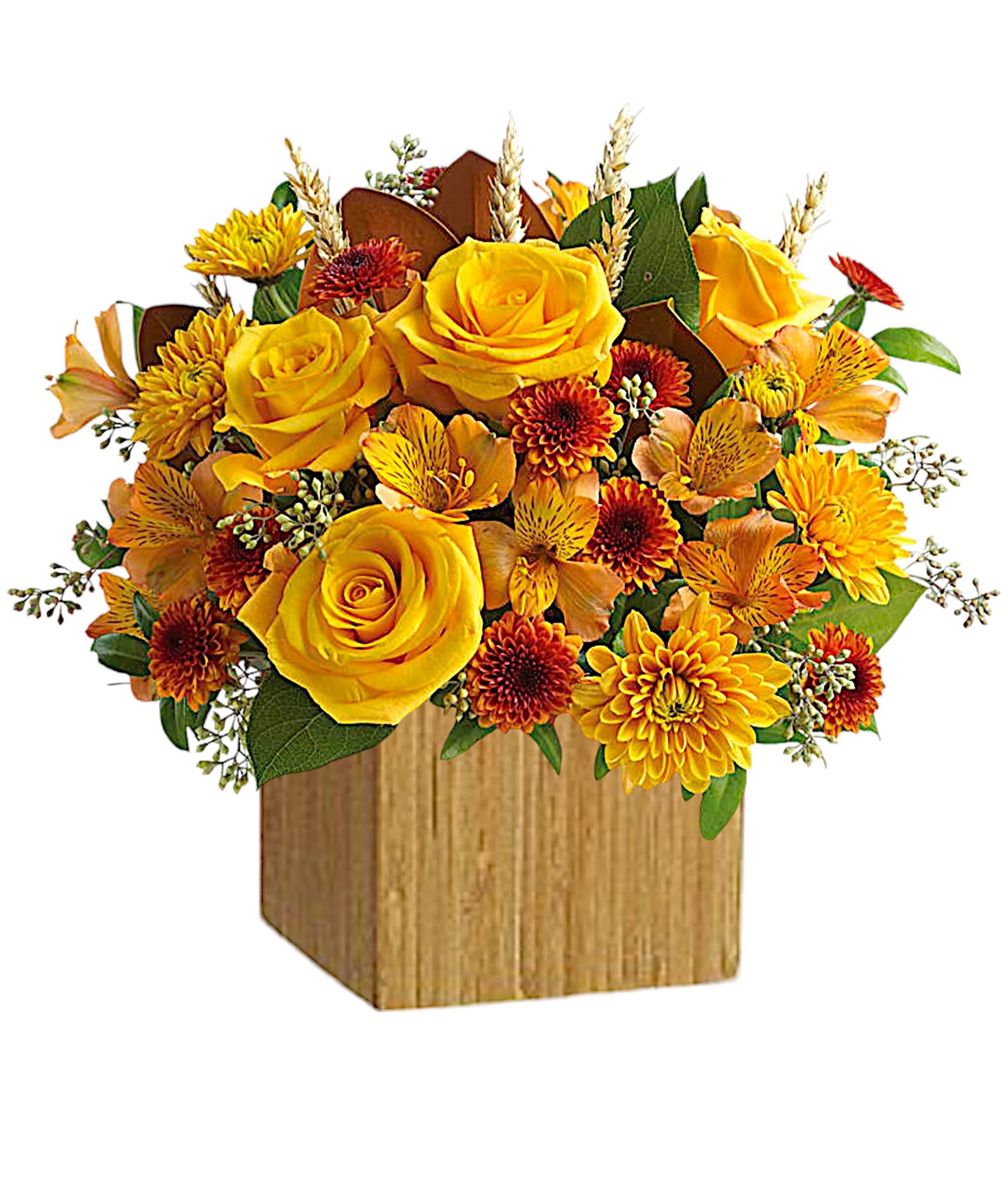 Yellow roses and orange mums arranged in a wooden box