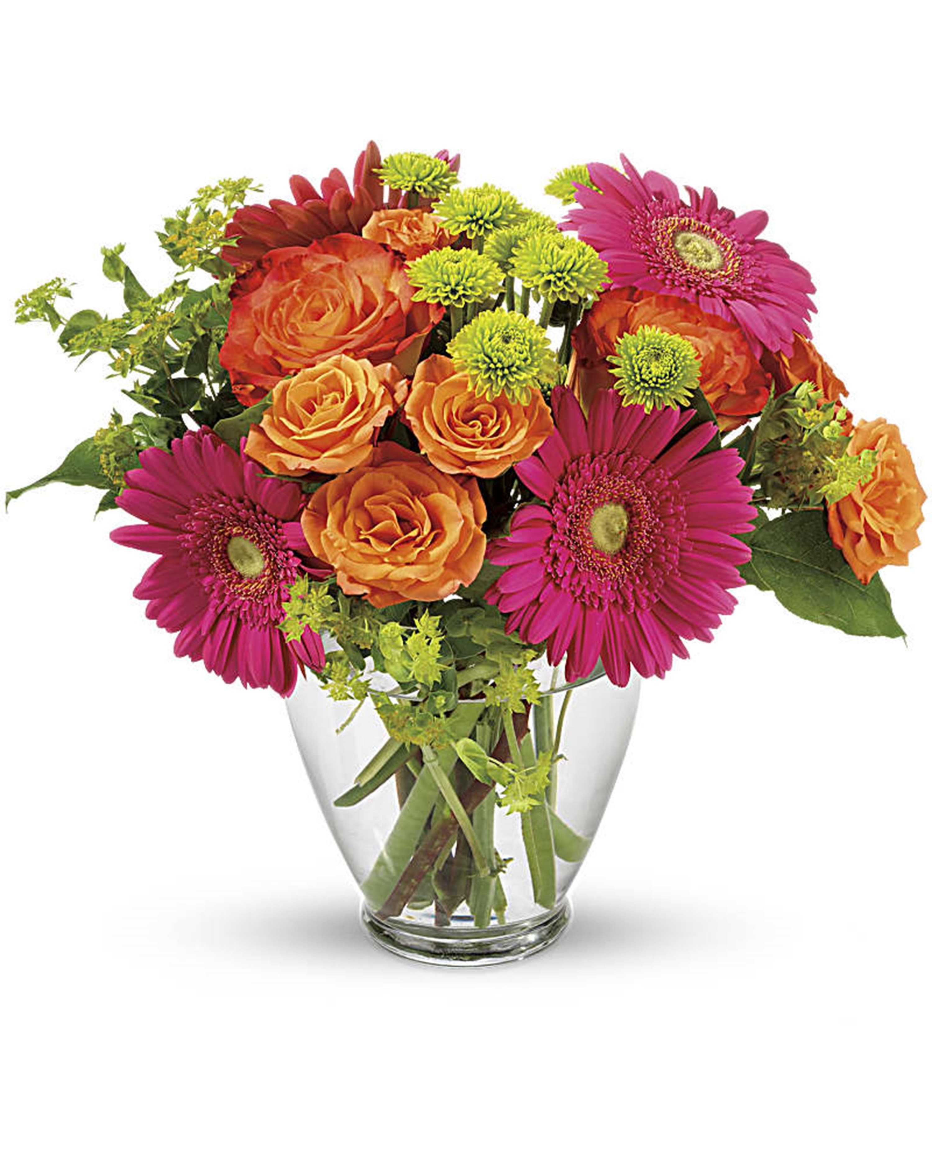 Bouquet of orange roses and pink gerbera daisies in a clear glass vase