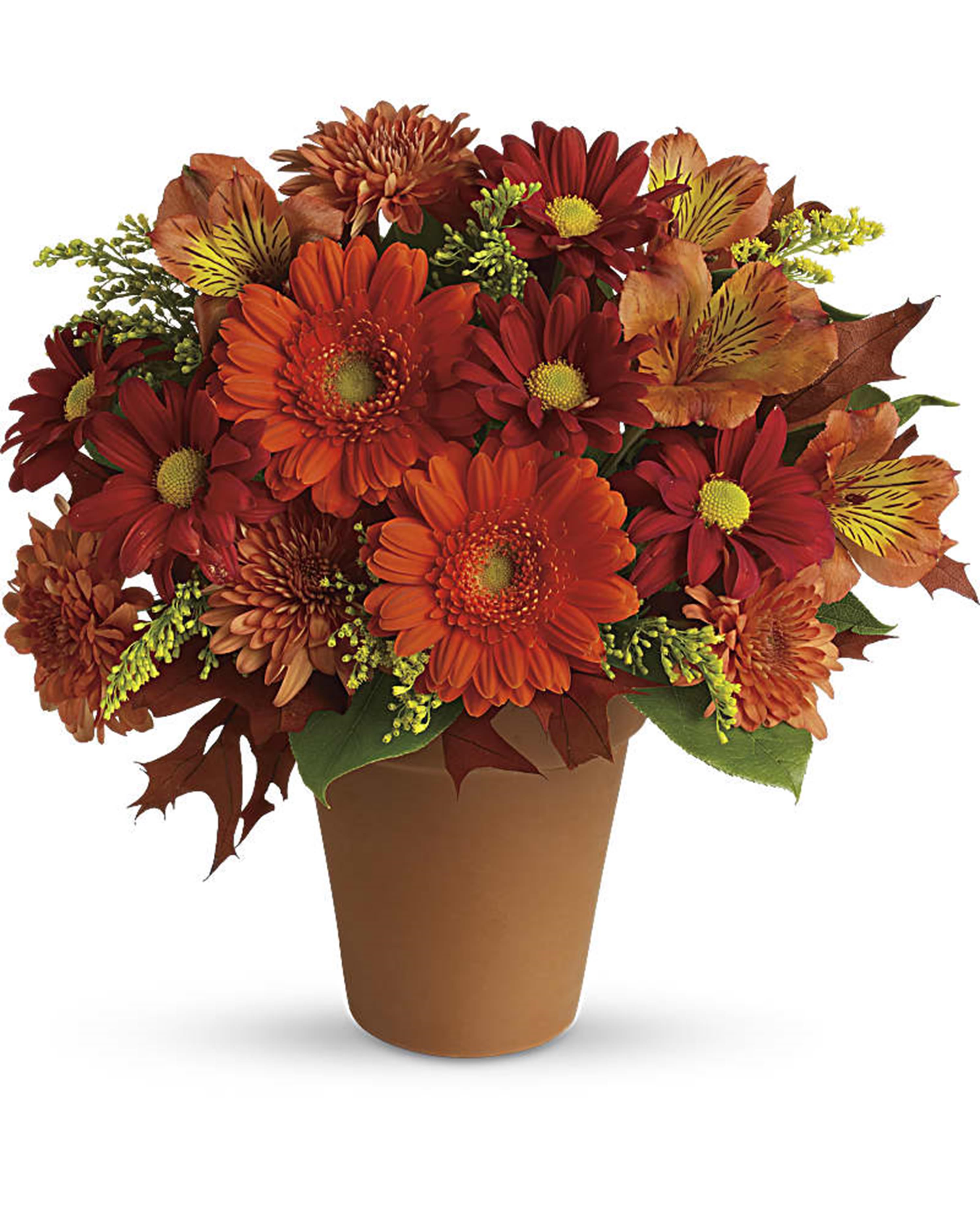 Orange and red mixed flower arrangement in a brown pot