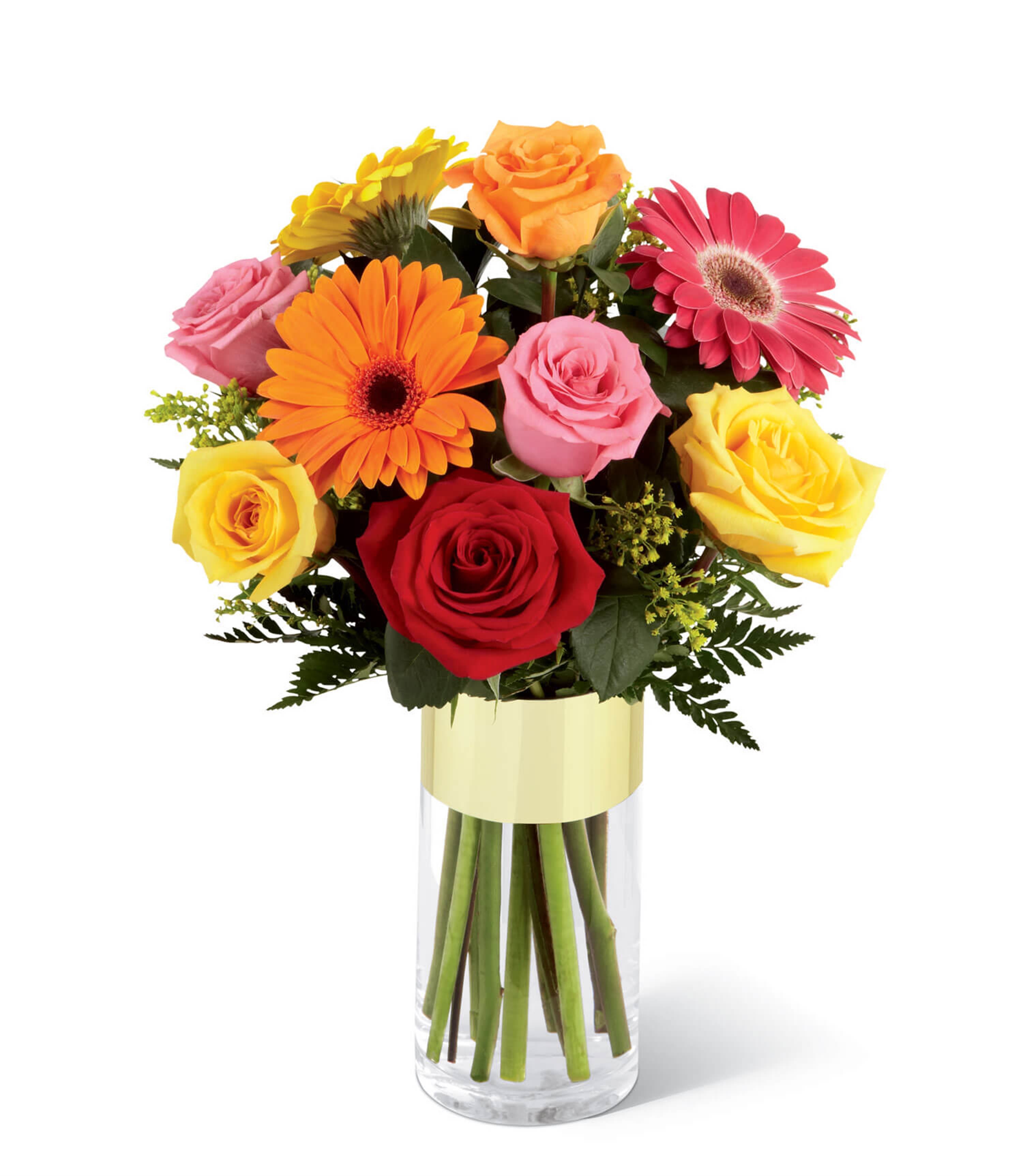 Mixed bouquet of roses and gerbera daisies in a clear glass vase