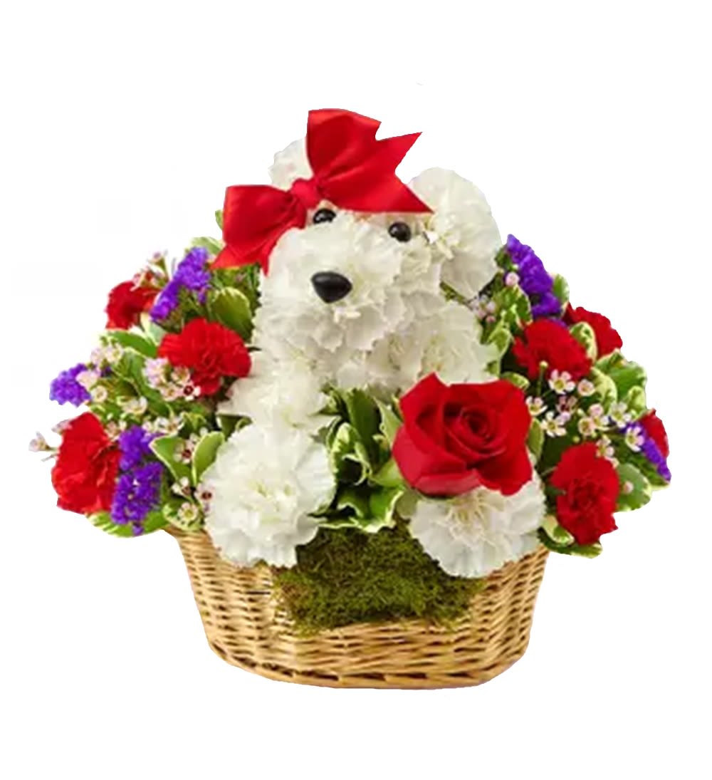 Teddy bear made of white flowers in a basket with red roses and a red bow