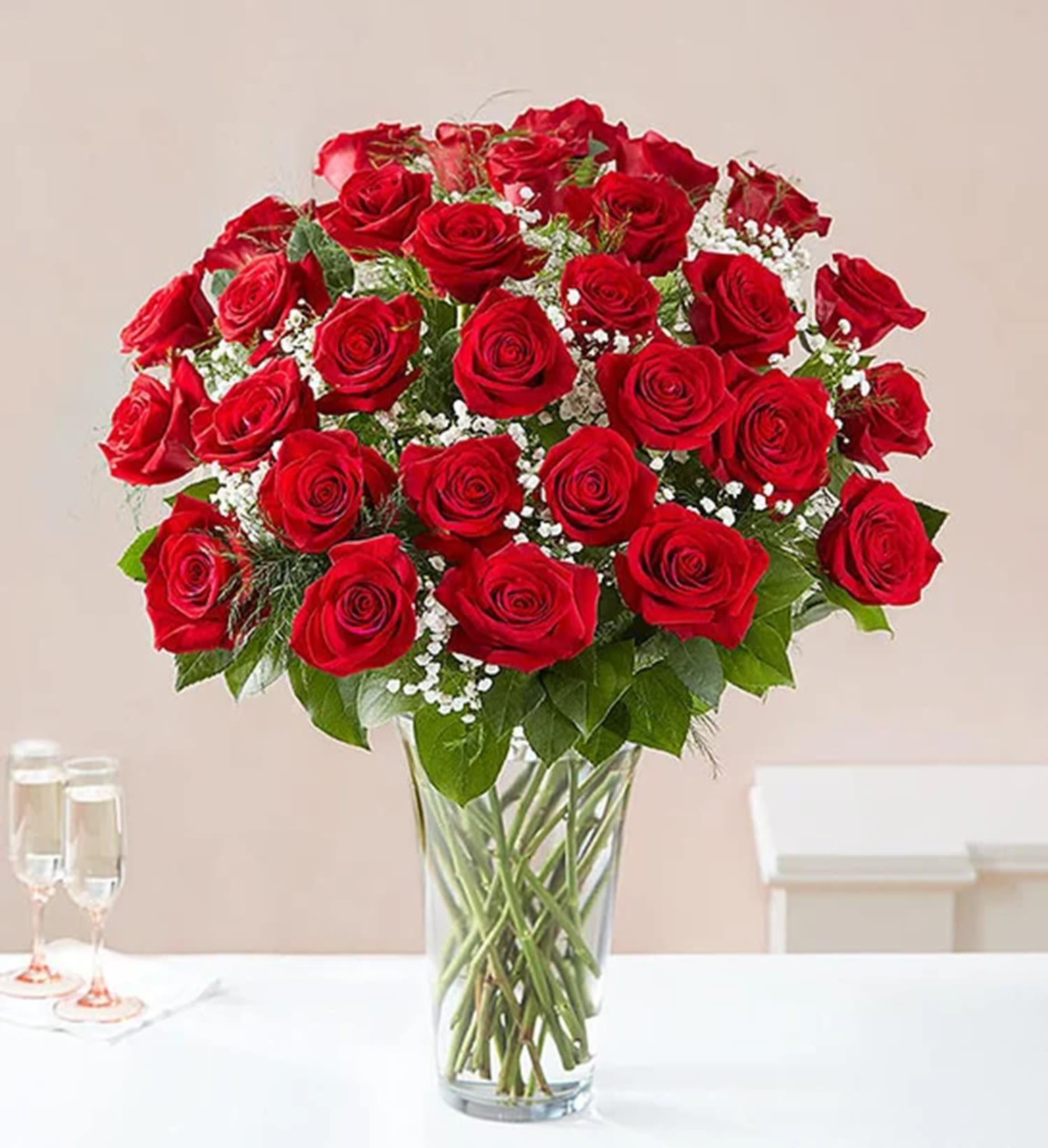 Bouquet of red roses in a clear glass vase