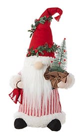 Santa figurine with a red hat, white beard, and small Christmas tree