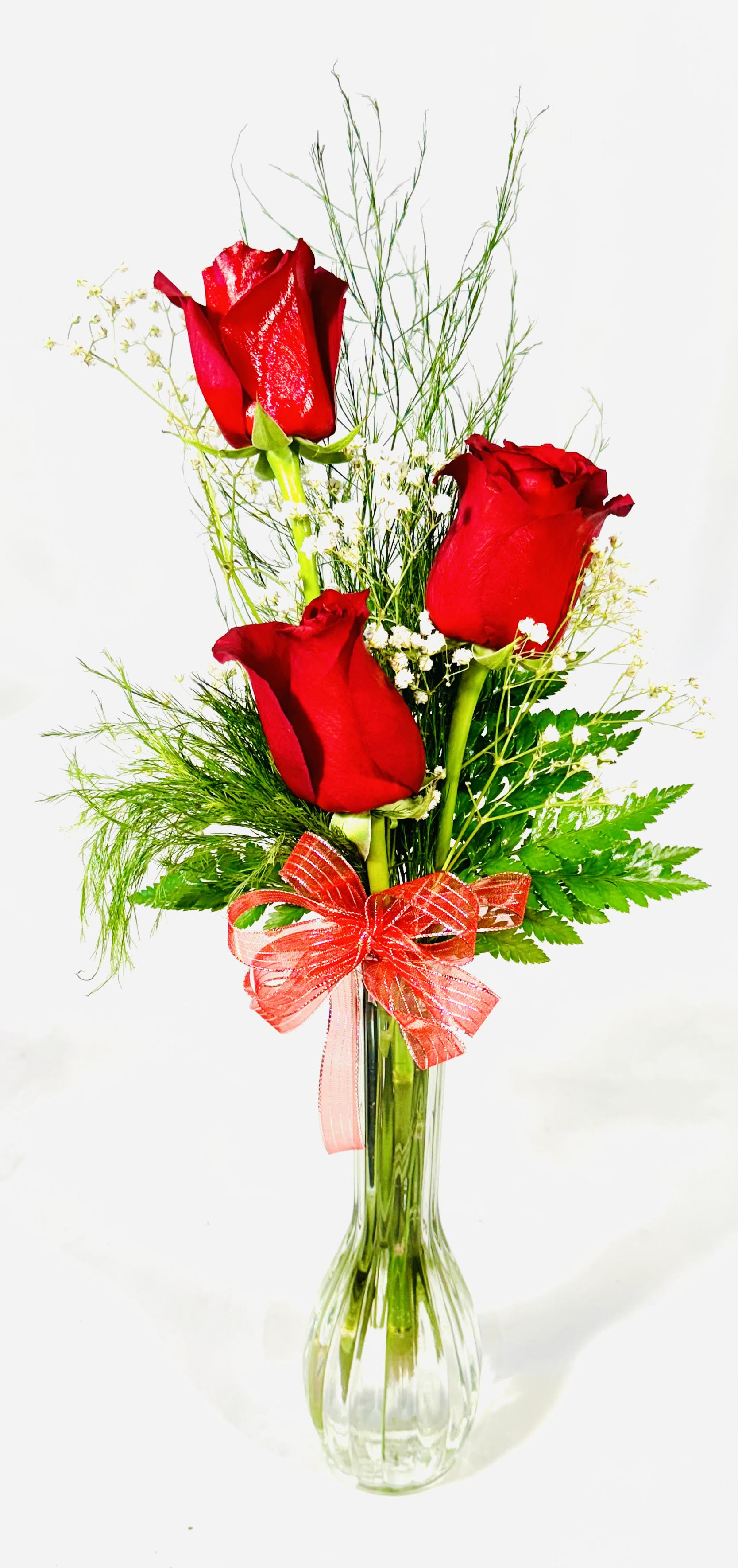 Three Red Rose's in Bud Vase -  A gift of three red roses is a traditional one-month anniversary gift. Or to simply say I Love You, Thinking of You or Just Because. 