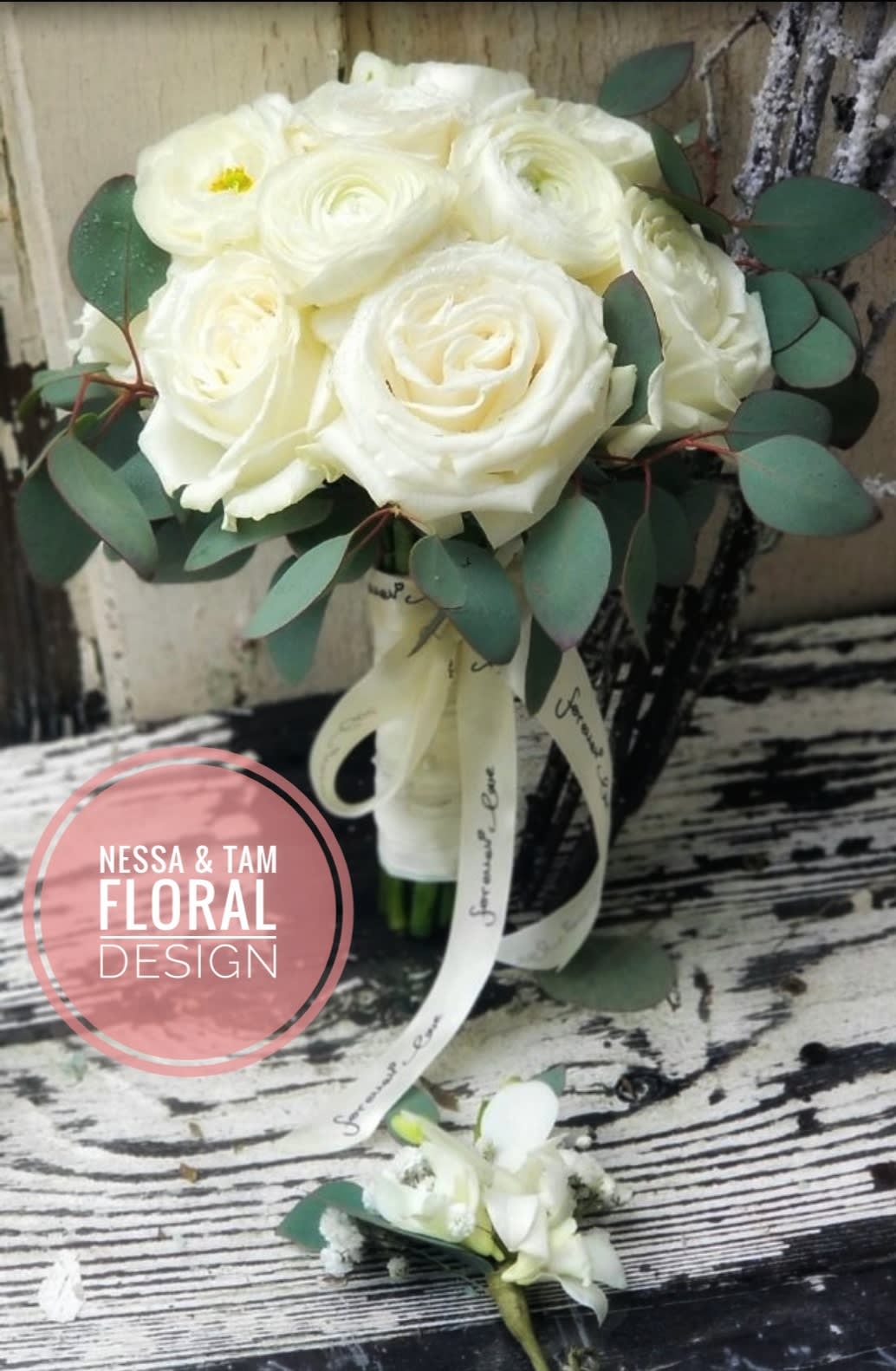 White rose bouquet with eucalyptus and ribbon