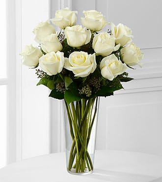 Dozen Long Stem White Roses by BloomNation™ - A dozen white roses are a classic gift! Perfect for Valentine's Day, an Anniversary, or any type of celebration.  Approximate Dimensions: 20"D x 30"H