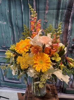 Harvest Sunrise - A beautiful presentation for your Thanksgiving holiday harvest table.  Subtle hues of fall accented with gerber daisies, lilies, alstroemeria and snapdragons.