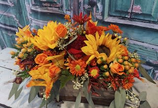 Autumn Country Box - Add a little autumn country blooms to your holiday table .  Vibrant fall colors accented with sunflowers, mums, hypericum berries, seeded yuk and spray roses.  