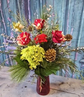Happy Holidays - Say Happy Holidays with this beautiful arrangement from Sunnyside Gardens. Accented with white and red variegated roses, limelight hydrangea and red carnations, this spectacular floral design makes the perfect holiday gift for yourself, family or friends.