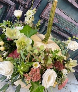 Fall Festive - Ready for fall?  This festive centerpiece embraces the season with a color pallete of limelight, green and coral and is highlighted by a white pumpkin focal point.  Gooodbye summer...Hello fall!