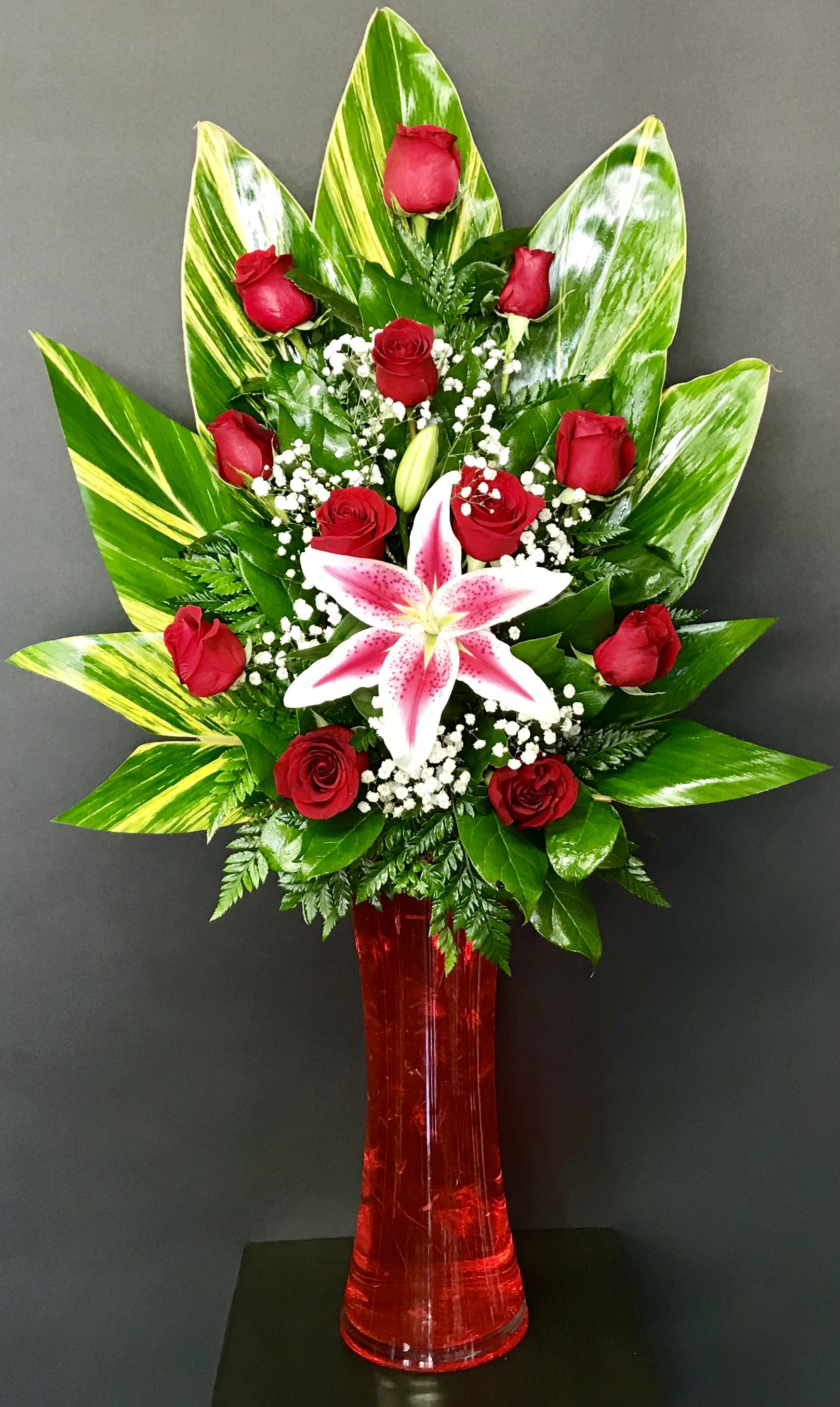 Kindle Of Roses - Show how much you love and appreciate the most important women in your life on this Mother's Day with one of our unique designs "Kindle Of Roses".