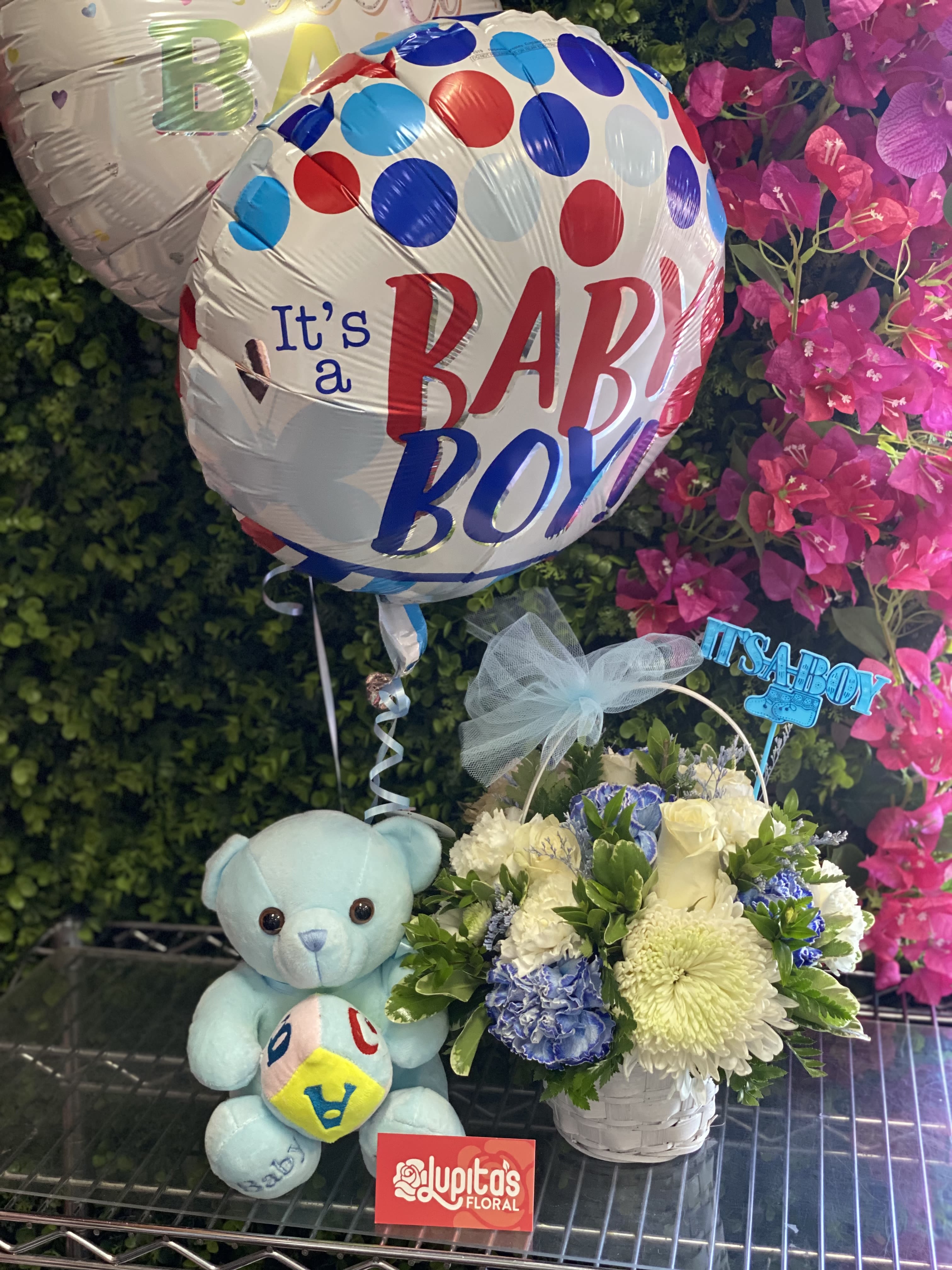 Baby boy balloon with a teddy bear and a small flower basket