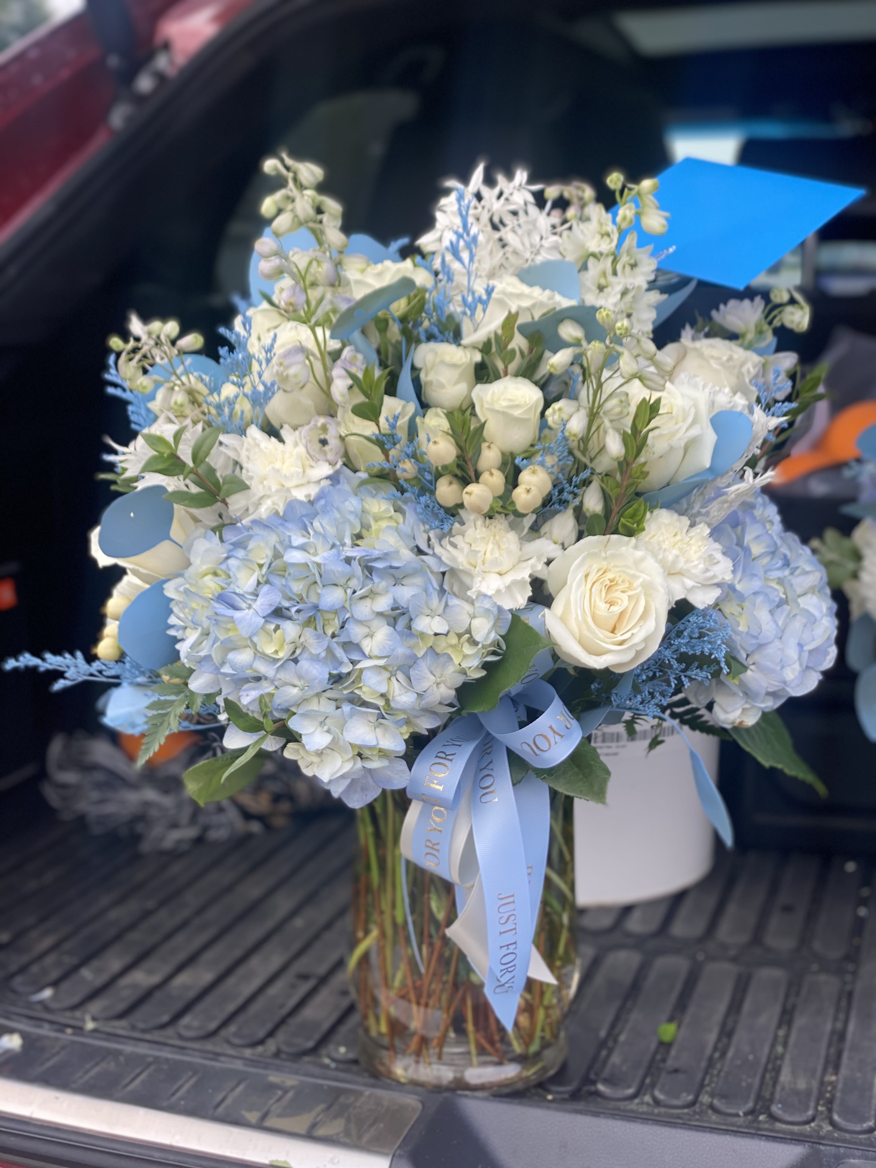 #16 Vase Mix with Blue - These include our every day flower mix.  You may request change in colors during checkout.  Photo is example of Deluxe. 