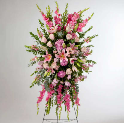 Compassion  - Pink roses, lilies, and more come together for a blushing pink standing easel funeral spray. 