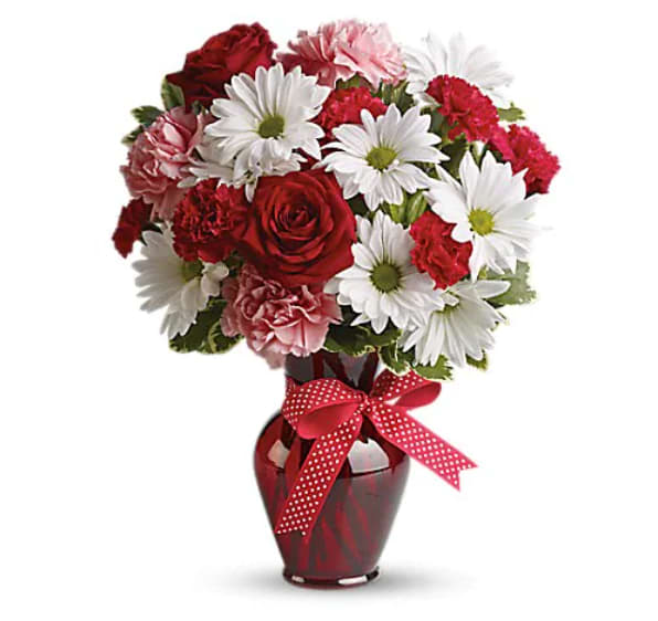 Hugs And Kisses Bouquet With Red Roses - Whether for your significant other or your sister, aunt or grandmother, this delightful floral gift is a sweet way to say "I love you." The charming bouquet includes white daisy spray chrysanthemums, pink carnations, red miniature carnations and red roses accented with fresh greenery in a stylish red vase.   