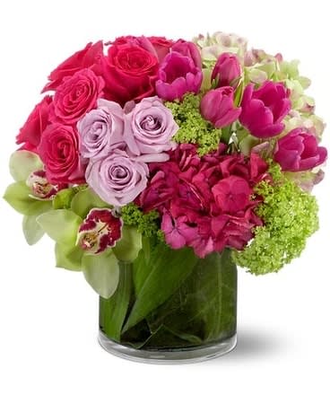 Floral Fantasia - Lush roses, exotic orchids, glossy tulips and hydrangea are some of the most beautiful fresh flowers available to floristsâ¦ and this lavish and upscale bouquet features them all, in a range of brilliant colors including vibrant hot pink, lavender and chartreuse. Simply spectacular.