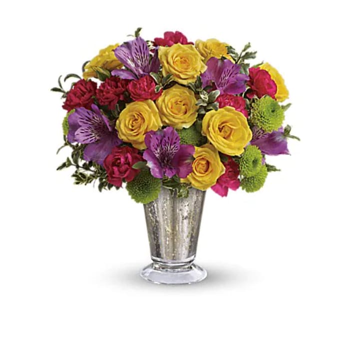 Fancy That Bouquet - A timeless Mercury Glass vase lends a fancy flourish to this uplifting bouquet. Yellow roses and miniature hot pink carnations are just the way to pop up her day! Includes yellow roses, purple alstroemeria, miniature hot pink carnations, green button spray chrysanthemums and fresh oregonia. Delivered in a Mercury Glass small julep. 