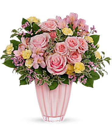 Gorgeous Grace Bouquet - A gift of style and grace, this gorgeous Mother's Day bouquet of ballet pink roses in a keepsake vase of shimmering European glass is sure to take her breath away. This pretty bouquet features pink roses, pink spray roses, pink alstroemeria, miniature light yellow carnations, pink limonium, lemon leaf and pitta negra. Delivered in a Dancing Beauty vase. 