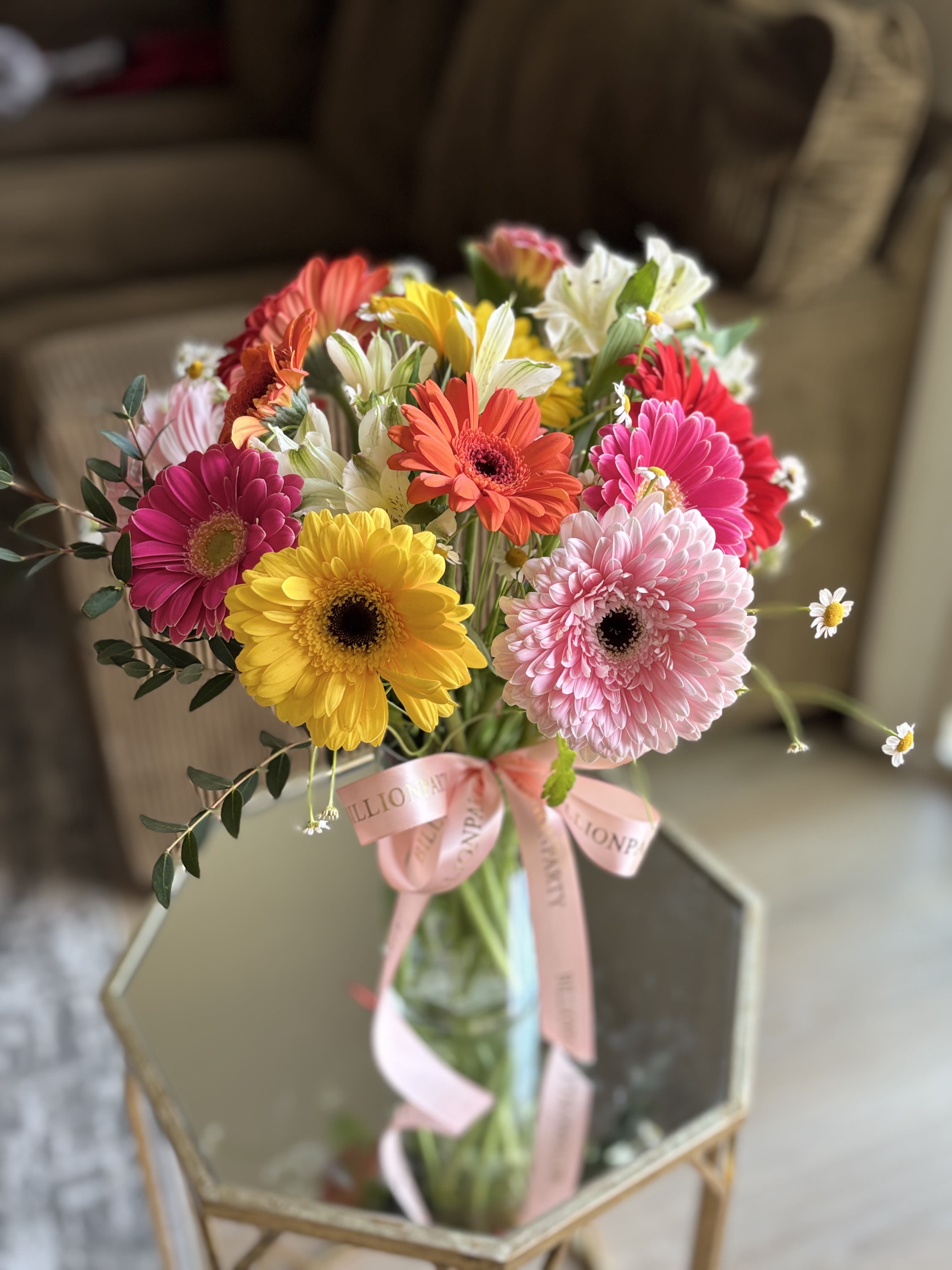 Daisies of love  - Fresh daisies arranged with   greenery.