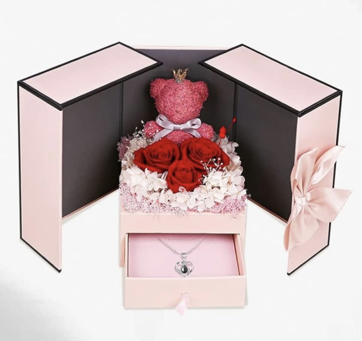 Forever Rose Teddy Bear gift set - Surprise that special someone with this beautiful gift set that is designed with preserved florals. Preserved roses that last over a year , preserved hydrangeas, and a teddy bear of preserved moss! And the cherry on top it comes with a heart necklace and a gift bag! The perfect gift! 