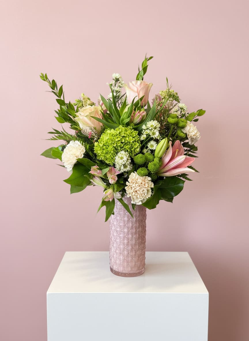 Ophelia - Ophelia is created with green hydrangeas, pink lillies, pink roses and filler flowers