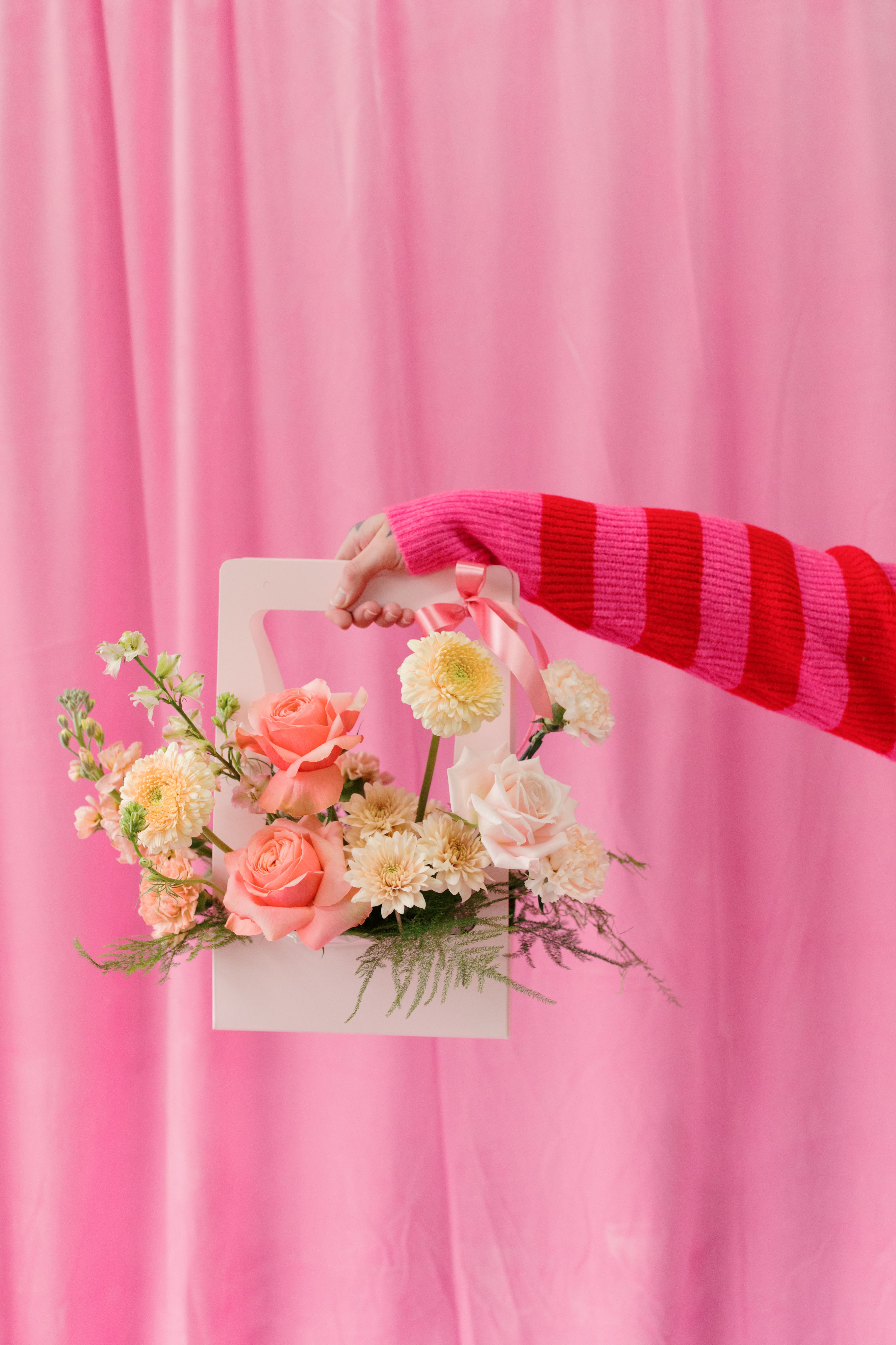 Garden Box - This cheerful and whimsical box of blooms is the perfect gift to brighten anyone’s day! The flowers are artfully arranged in a container, nestled inside a gorgeous presentation box for a beautiful, ready-to-give experience. The combination of vibrant colors and playful design makes this arrangement a delightful surprise for any occasion. Whether it's a celebration or just a thoughtful gesture, this convenient, all-in-one floral gift is sure to bring joy and smiles.