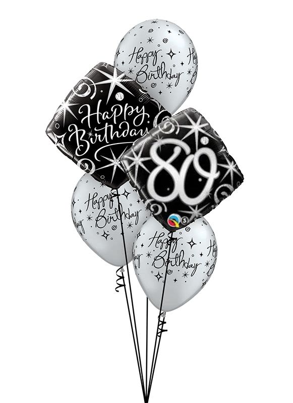 Cluster of black and white birthday balloons with star patterns