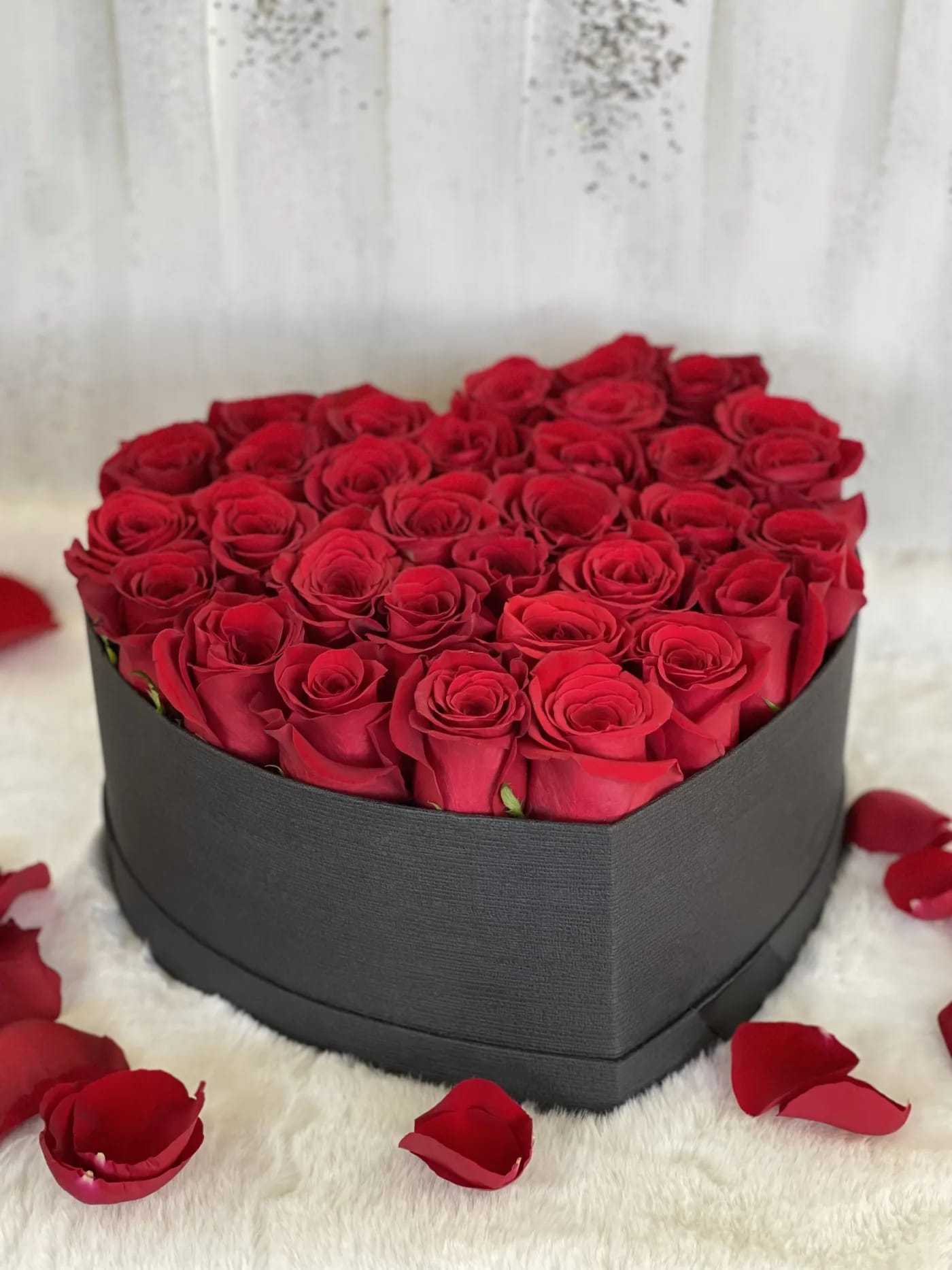 RED ROSE HEART BOX IN BLACK  - This heart shaped box includes 24 plus roses 