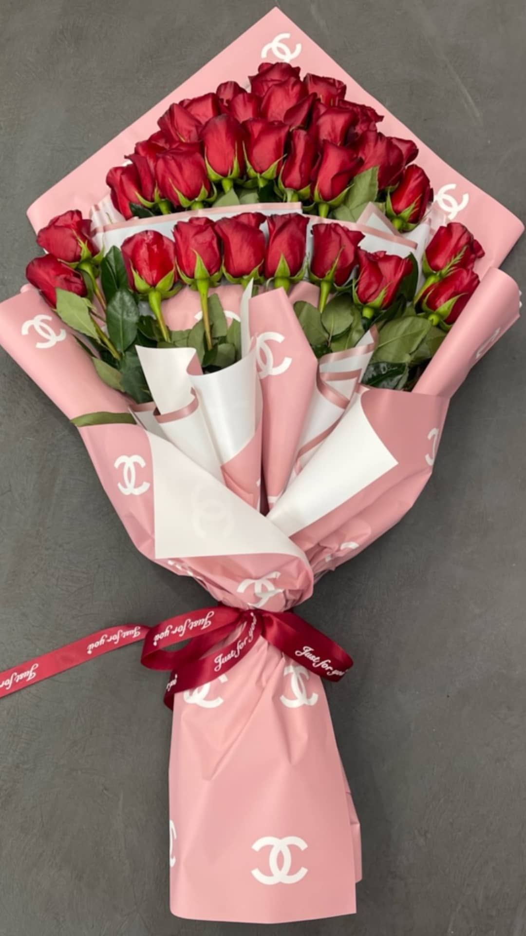 24 roses wrapped around  - Two dozen roses,any colors,with greenery and baby breath 