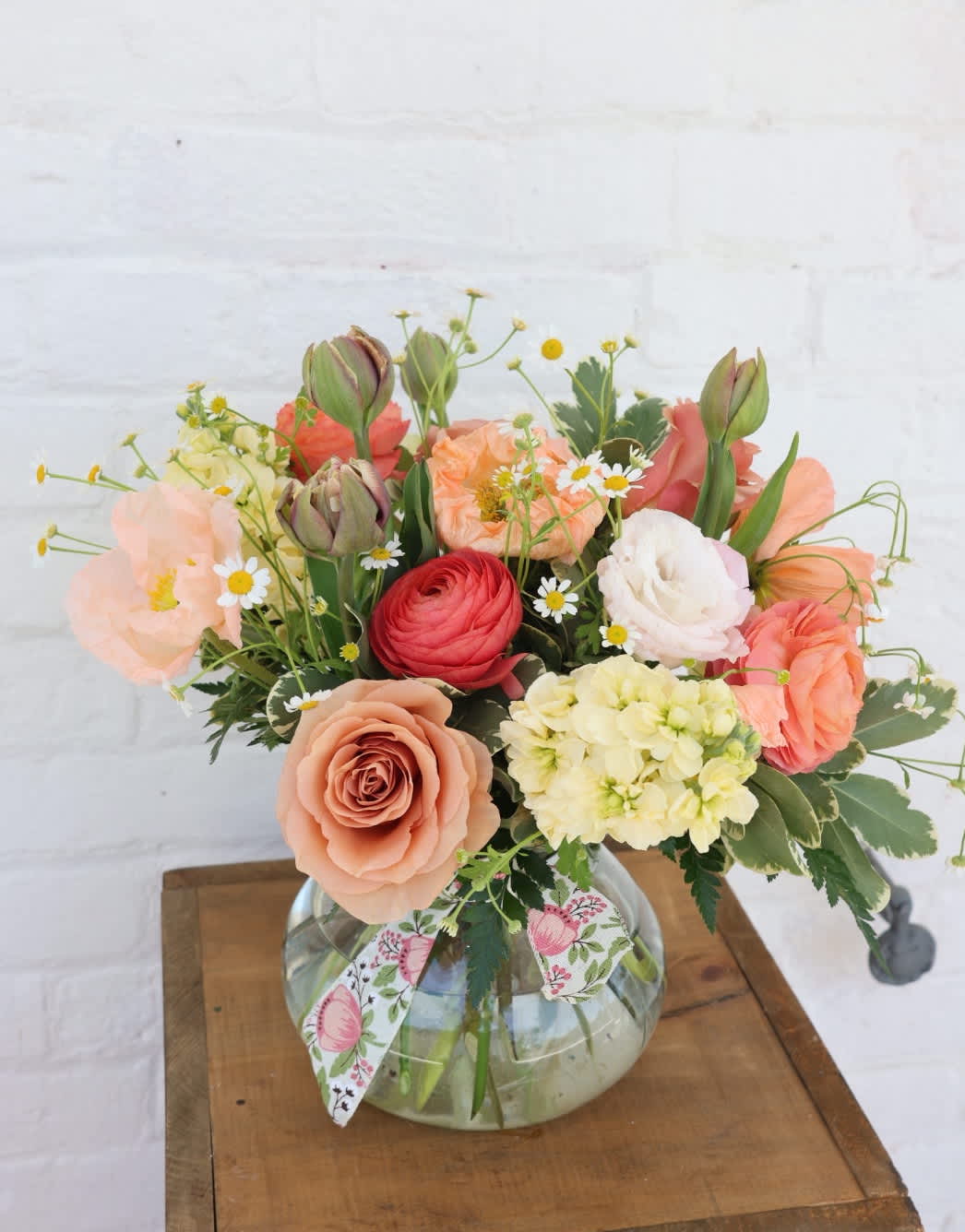 Posey - a creamy summer color palette with fragrant flowers and a few locally grown blooms in a low glass posey vase