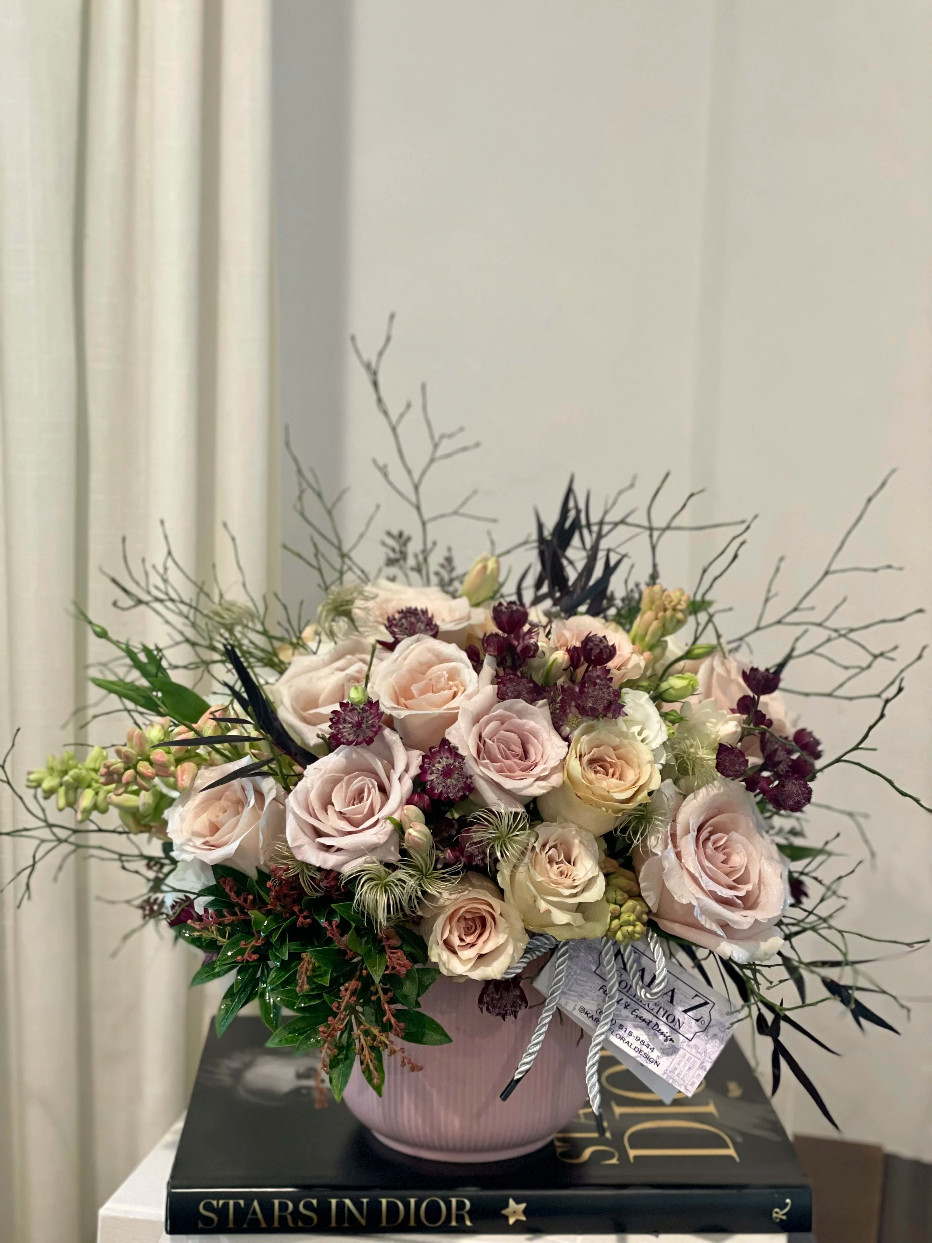 Sahara Petals  - Beautiful blush nude roses, lush greens arranged with other premium and seasonal florals to create a one of a kind arrangement. Ideal for any occasion and sure to make a statement. 