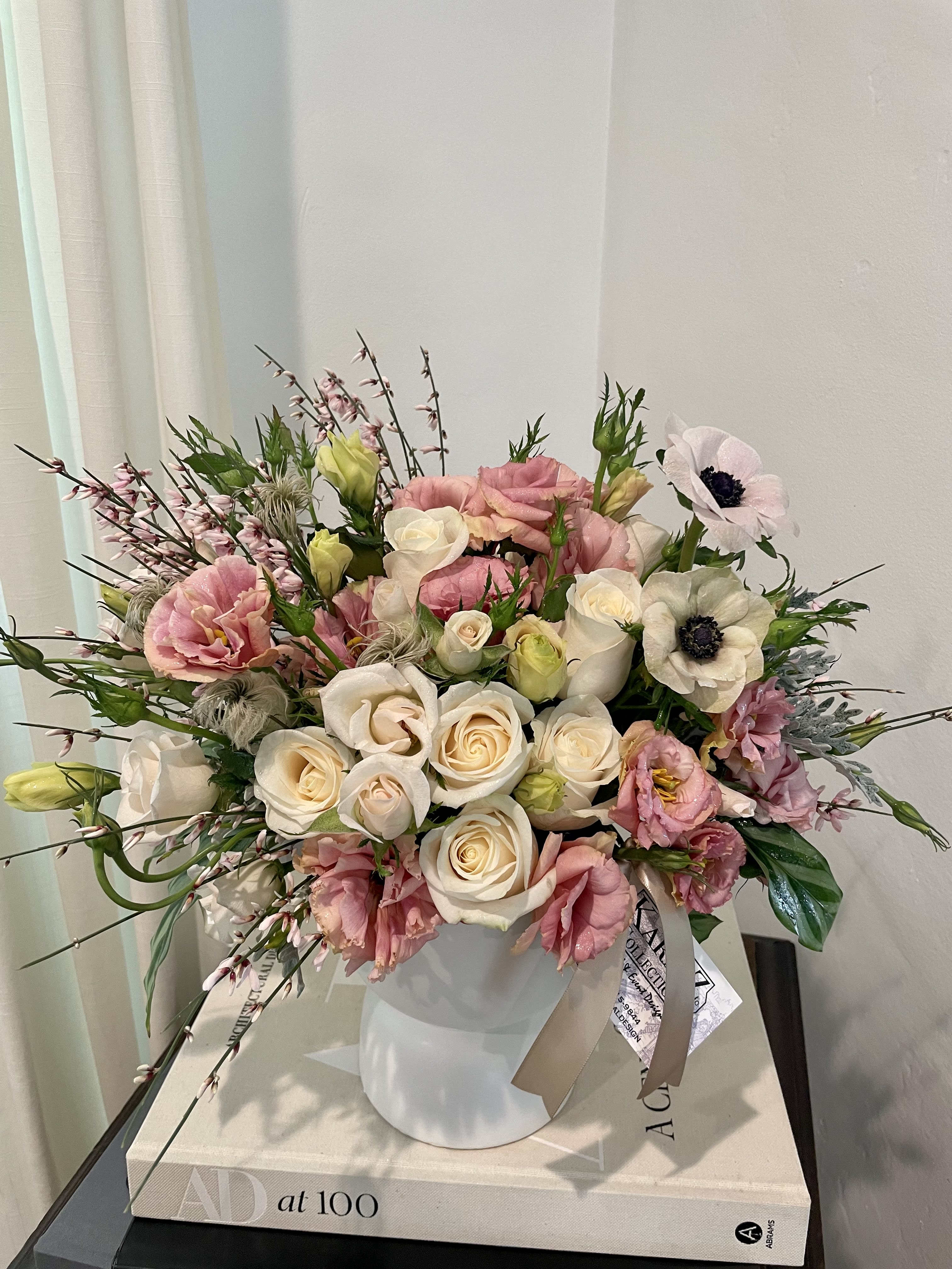 Sweetheart  - Beautiful white roses, blush lisianthus, and lush greens arranged with other premium and seasonal florals to create a one of a kind arrangement. Ideal for any occasion and sure to make a statement. 