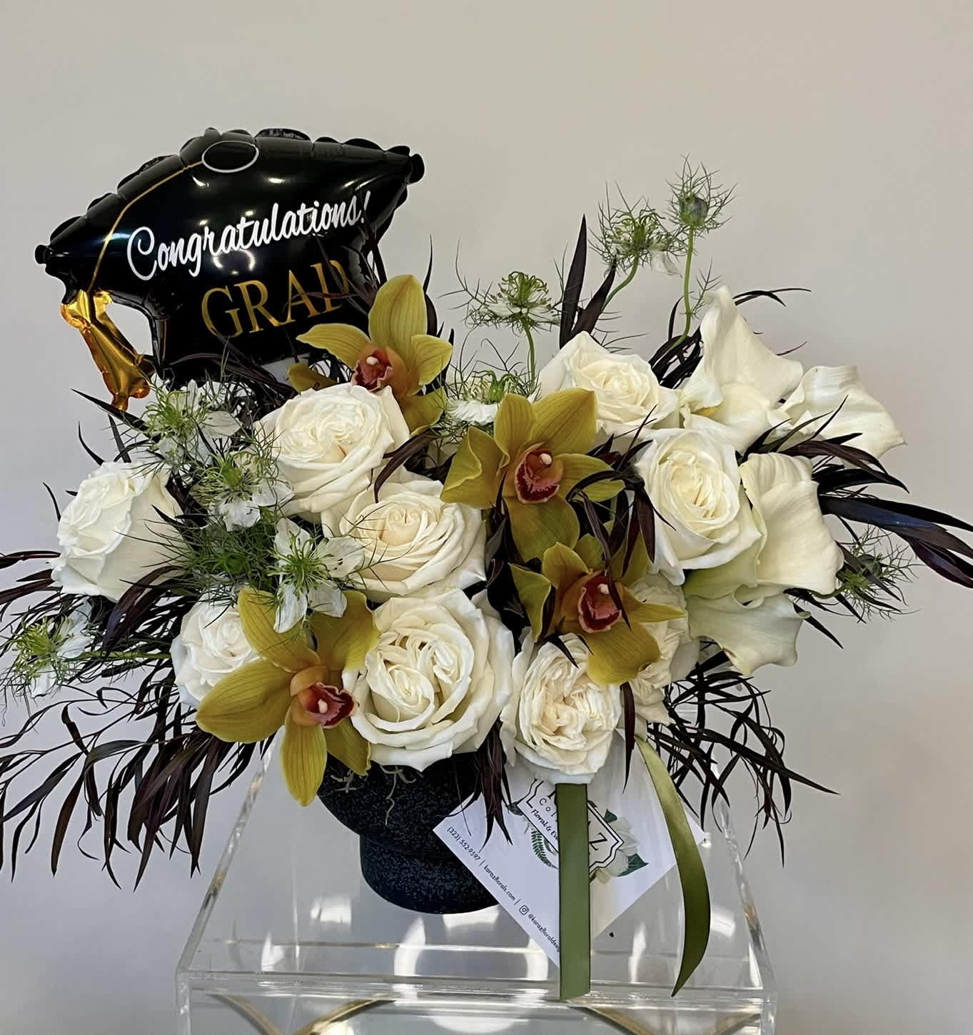 Sophisticated Graduate - The perfect florals for the graduate with good taste.  Florals includes balloon, unless otherwise stated. 
