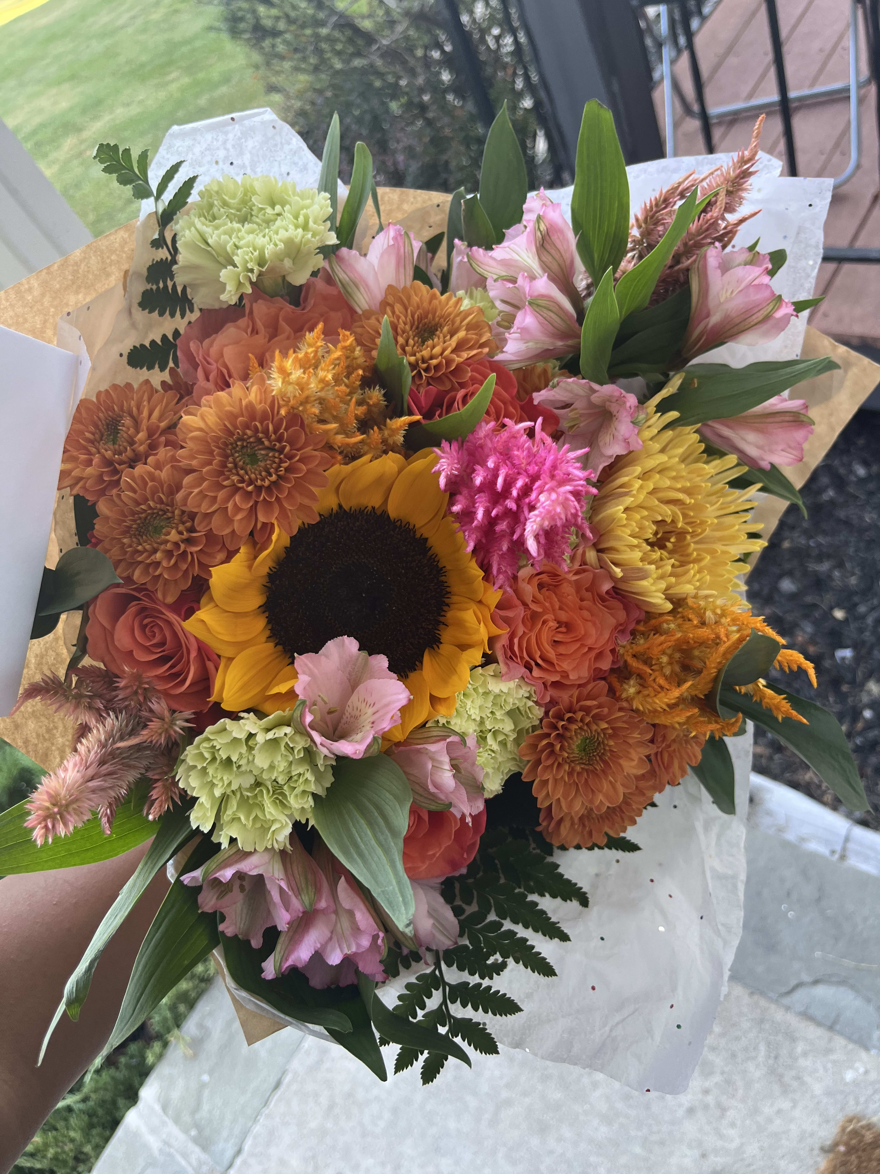 Fall Mix designers Choice  - This arrangement is a wrapped bouquet with a mix of beautiful fall colors, with the freshest blooms of the day 