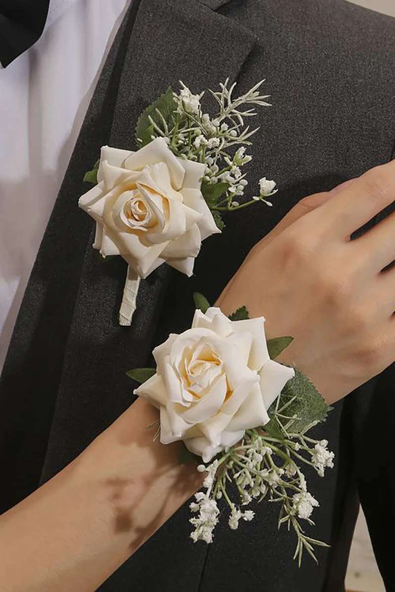 White rose boutonniere and wrist corsage with baby's breath