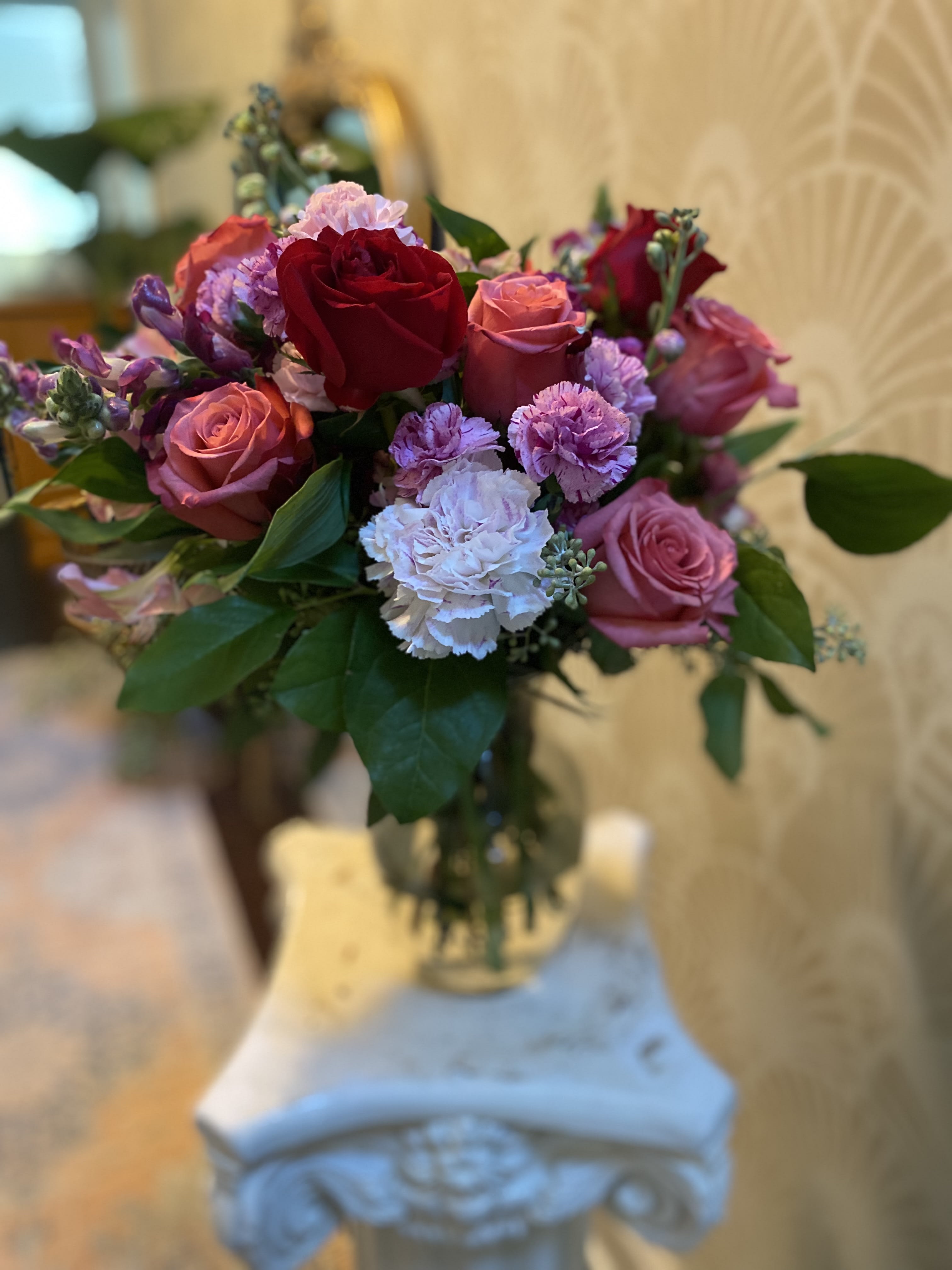 Florals on Elm St. - We cherish the details here at flist which is why the Cherish arrangement have quickly become our best selling economical arrangement. With a medley of pink variations of roses and carnations  with our seasonal greenery makes it the perfect token of love or appreciation.
