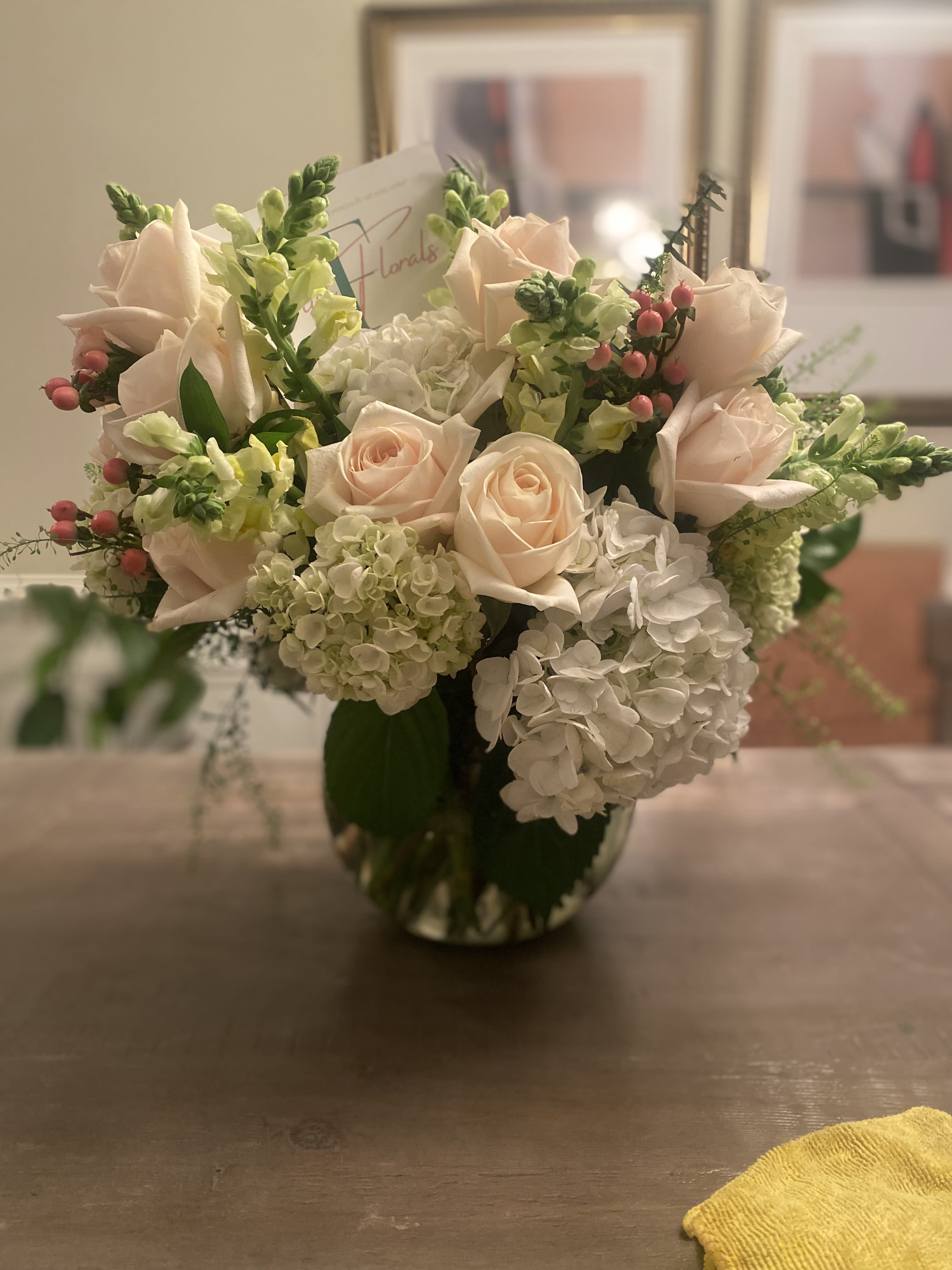 Elle Vee - A luscious combination of hydrangeas &amp; roses adorned with seasonal  blush colored fillers.  *Premium shown