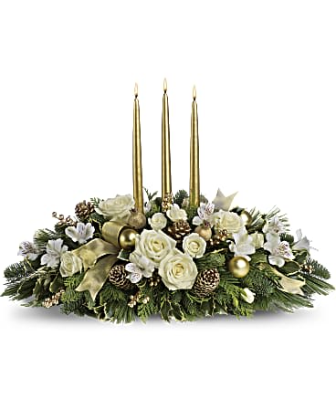 Holiday centerpiece with white roses and gold candles