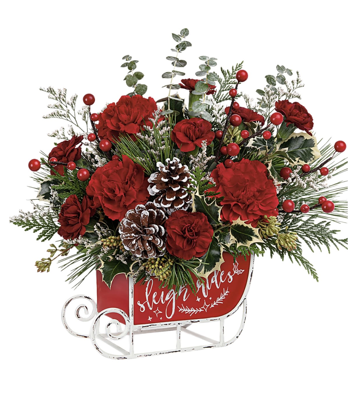 Red carnations and pinecones in a sleigh-shaped container