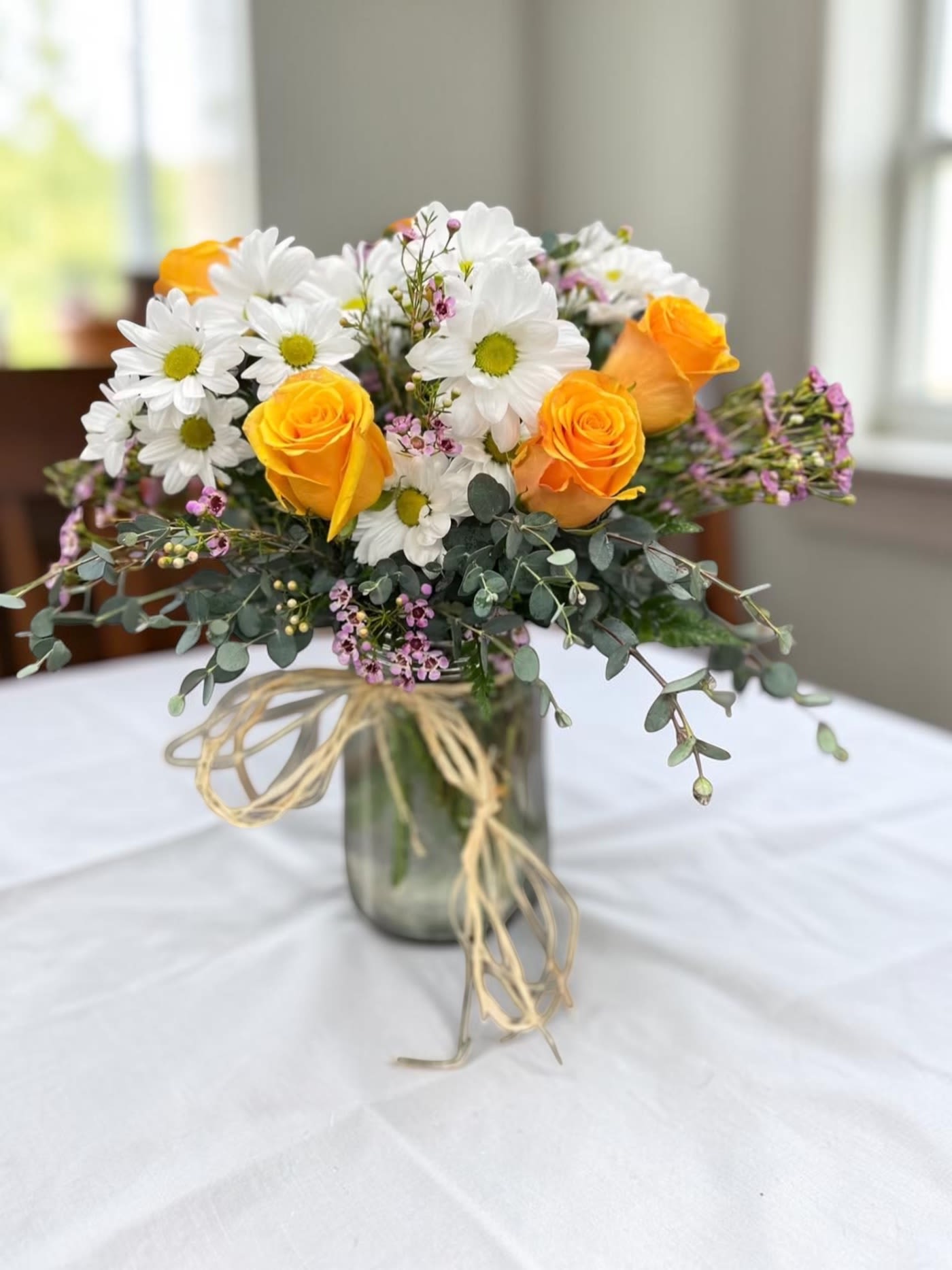 You make me smile - Yellow roses, white daises with greenery and fillers. YOU CAN REQUEST COLORED ROSE'S OF YOUR CHOICE AND COLORED DAISY'S.  