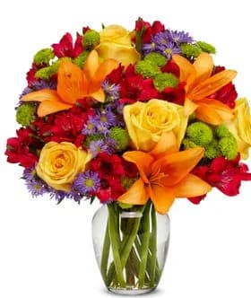 rick bouquet - erflowing with yellow roses, orange lilies, green daisy poms, and lavender asters, this bouquet is an a feast for the senses. These fragrant and beautiful flowers will fill up any room with color and make the day of any friend or loved one. Send them today and have them delivered same day!