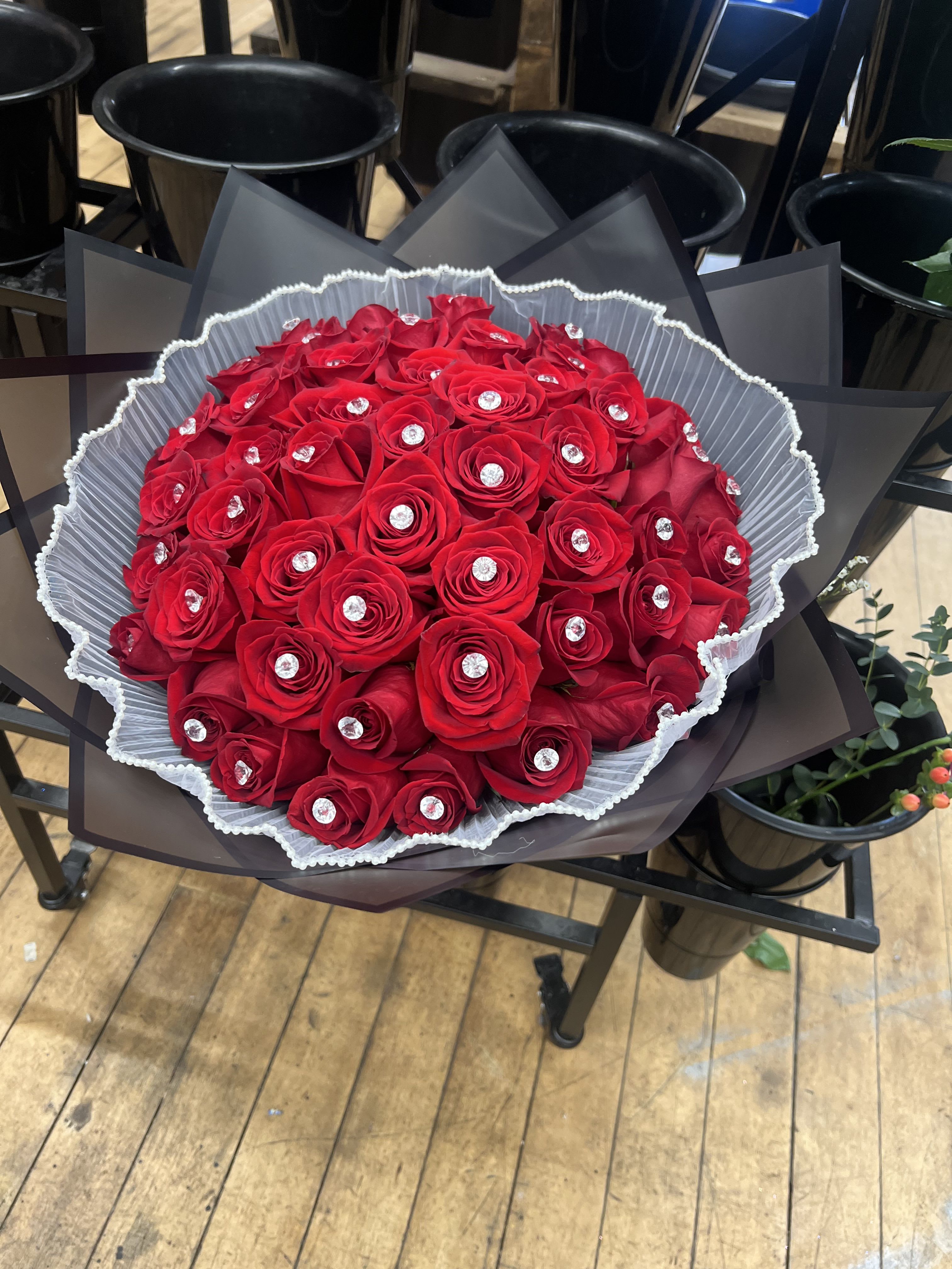 50 buchon deluxe  - 50 long stem roses 