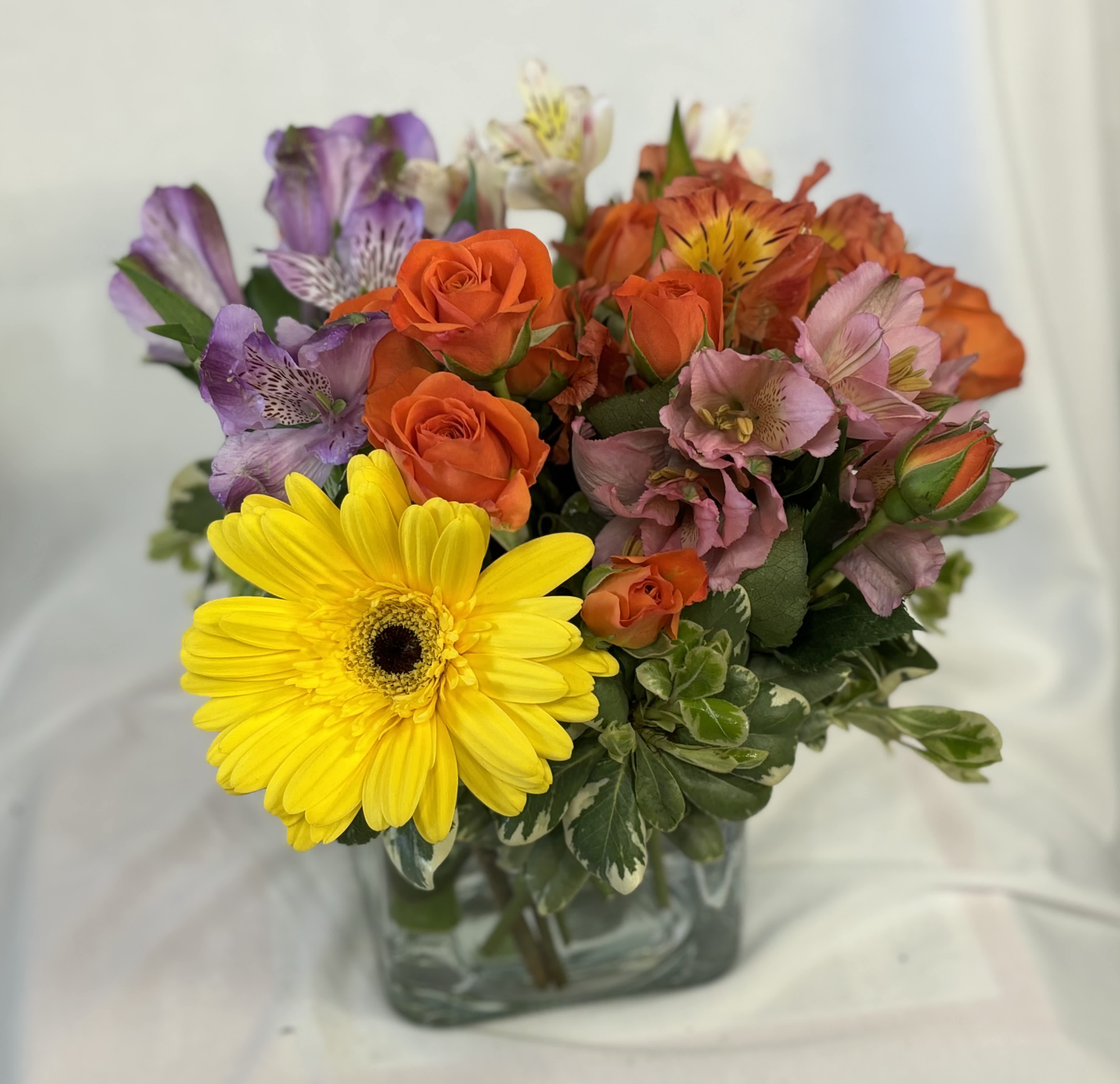 Sunset Splendor  - yellow gerb, orange sprayroses; pink purple &amp; white alstro