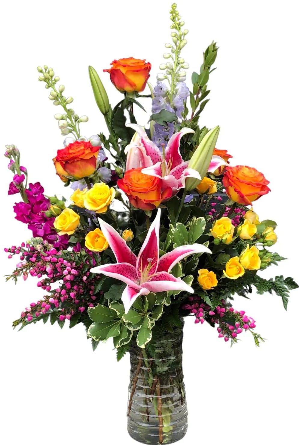 Kaleidoscope - Breathtaking arrangement of roses, spray roses, stargazer lilies, hybrid delphinium, heather and stock. 
