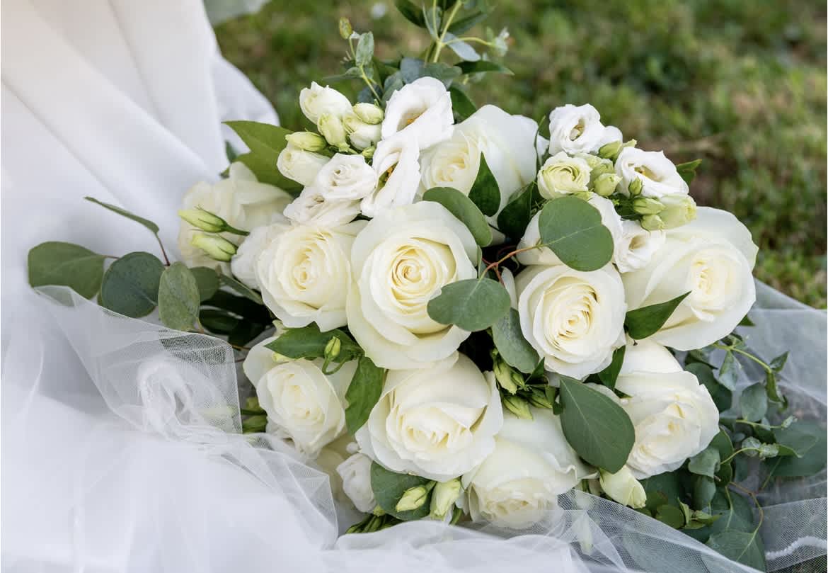 Classic White Rose Wedding Bouquet  - A dozen white roses adorned with white lisianthus.  