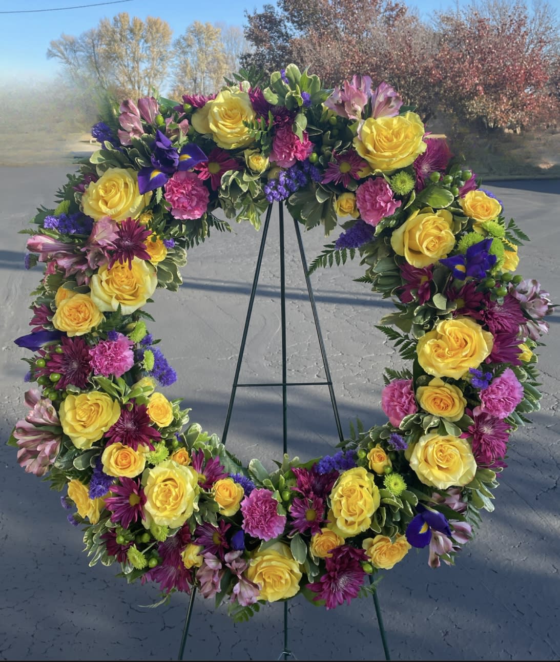 Vibrant Serenity Wreath  - Beautiful 22" Open Wreath filled with a beautiful garden variety of flowers in vibrant feminine colors.  Colors can can changed upon request. 