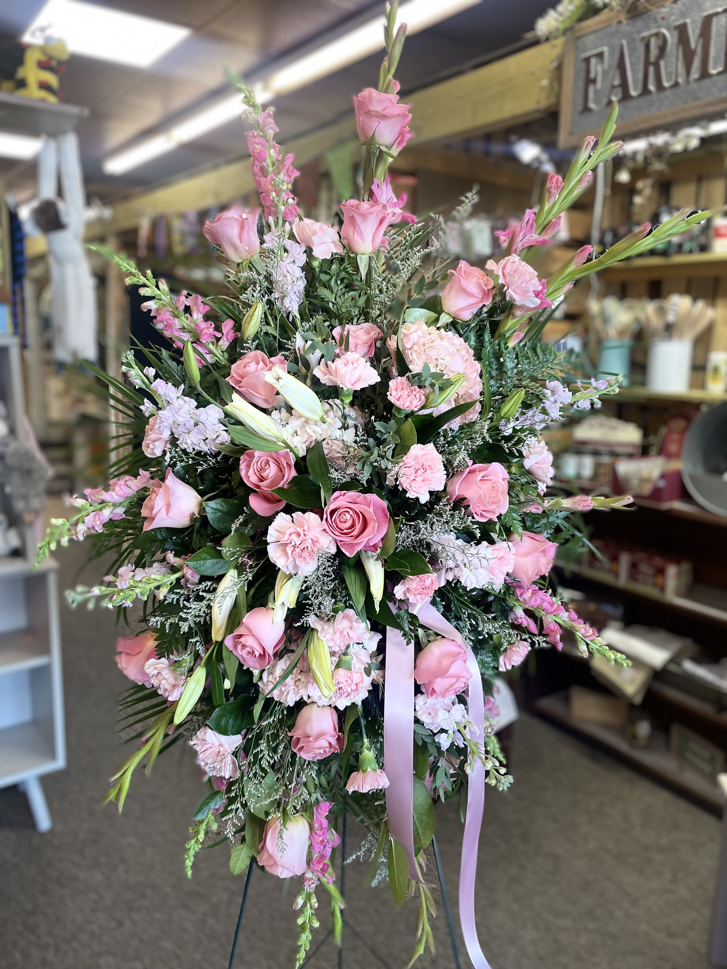 Blushing Memories  - White and pink traditional sympathy flowers. 